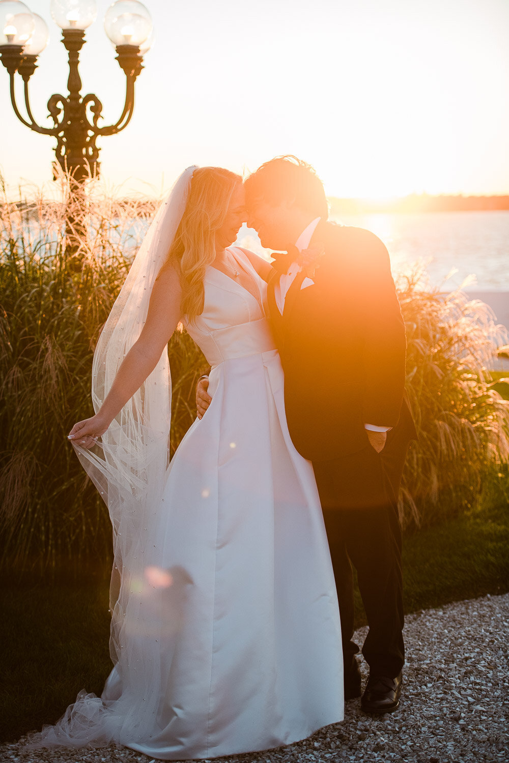 bride and groom sunset portrait