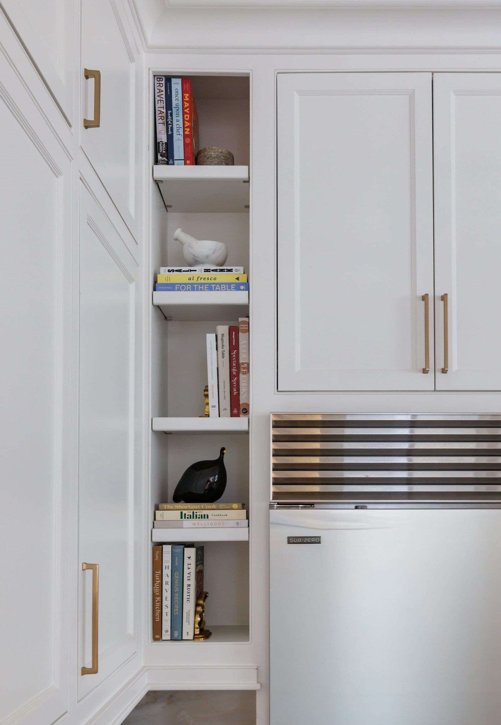 vision and hammer open styled shelves in kitchen corner nook