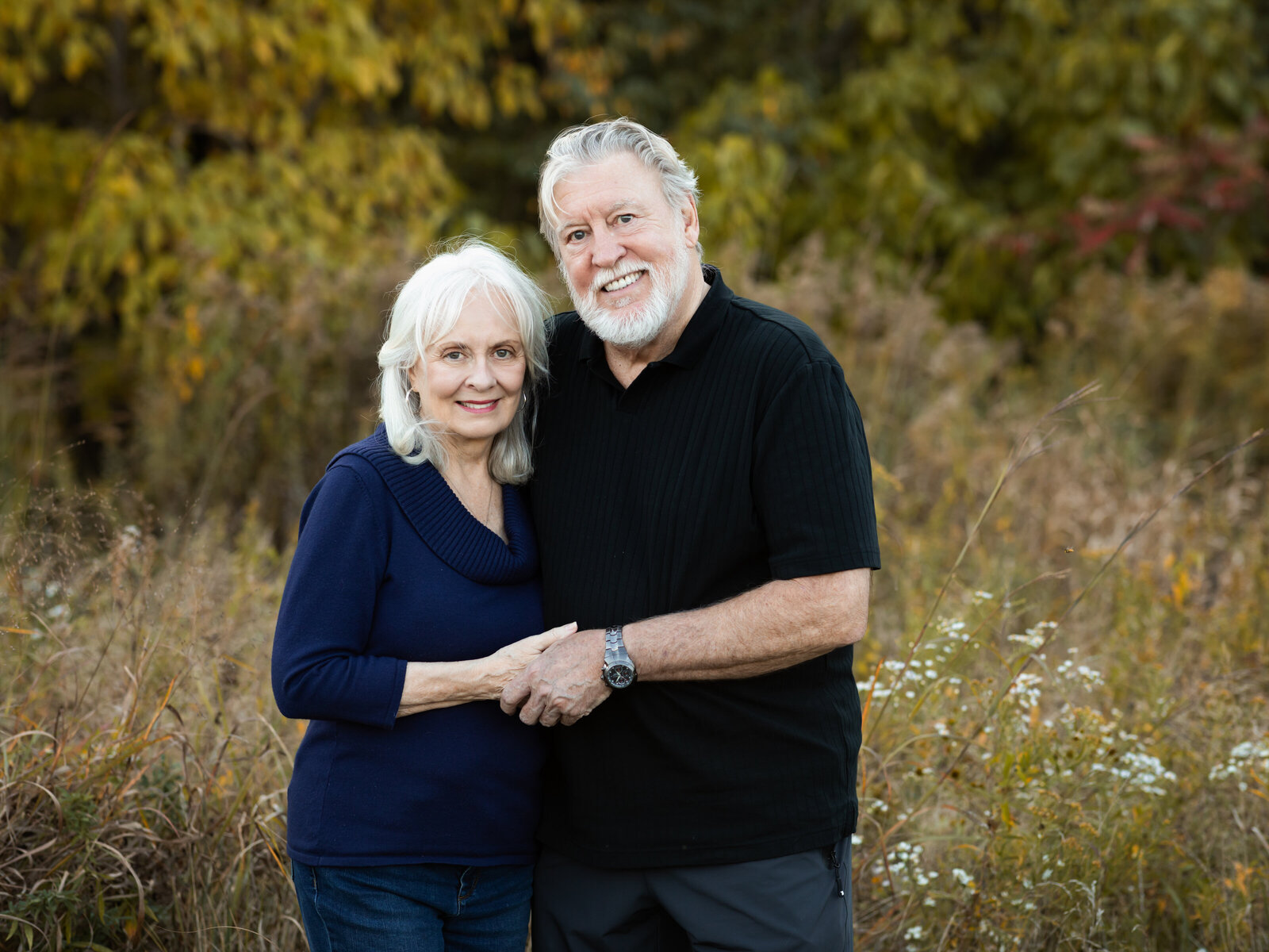 grandparents hugging for family photos at westcreek reservation in parma, Ohio