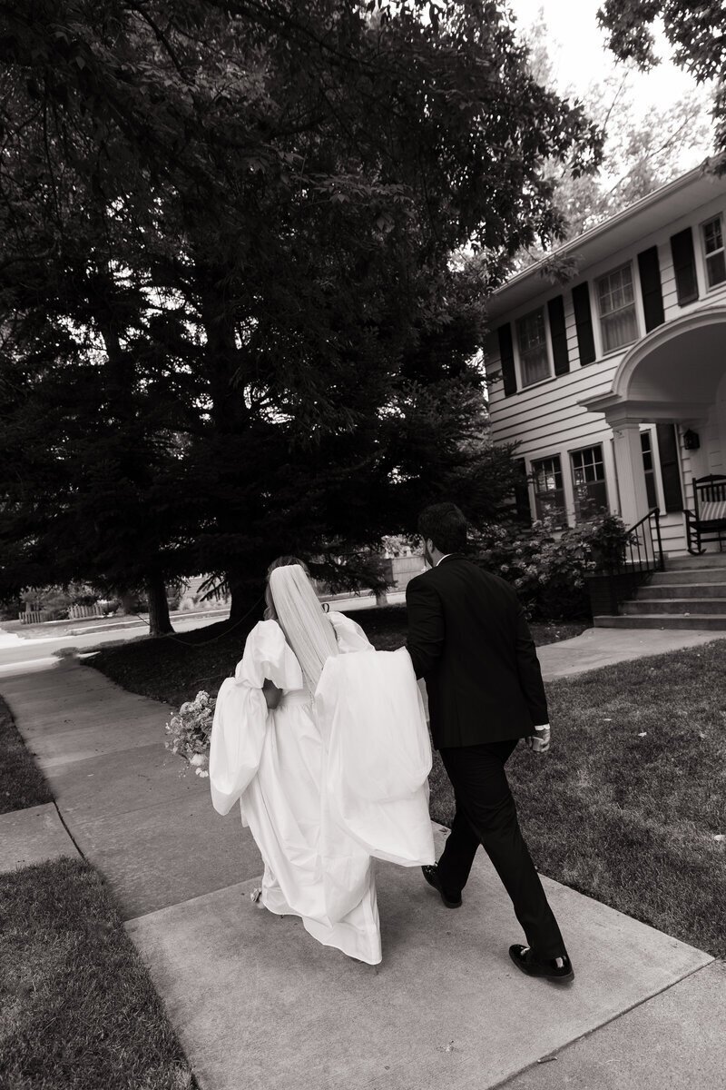 bride and groom walking taken by idaho elopement photographer Erica Rochelle Photography