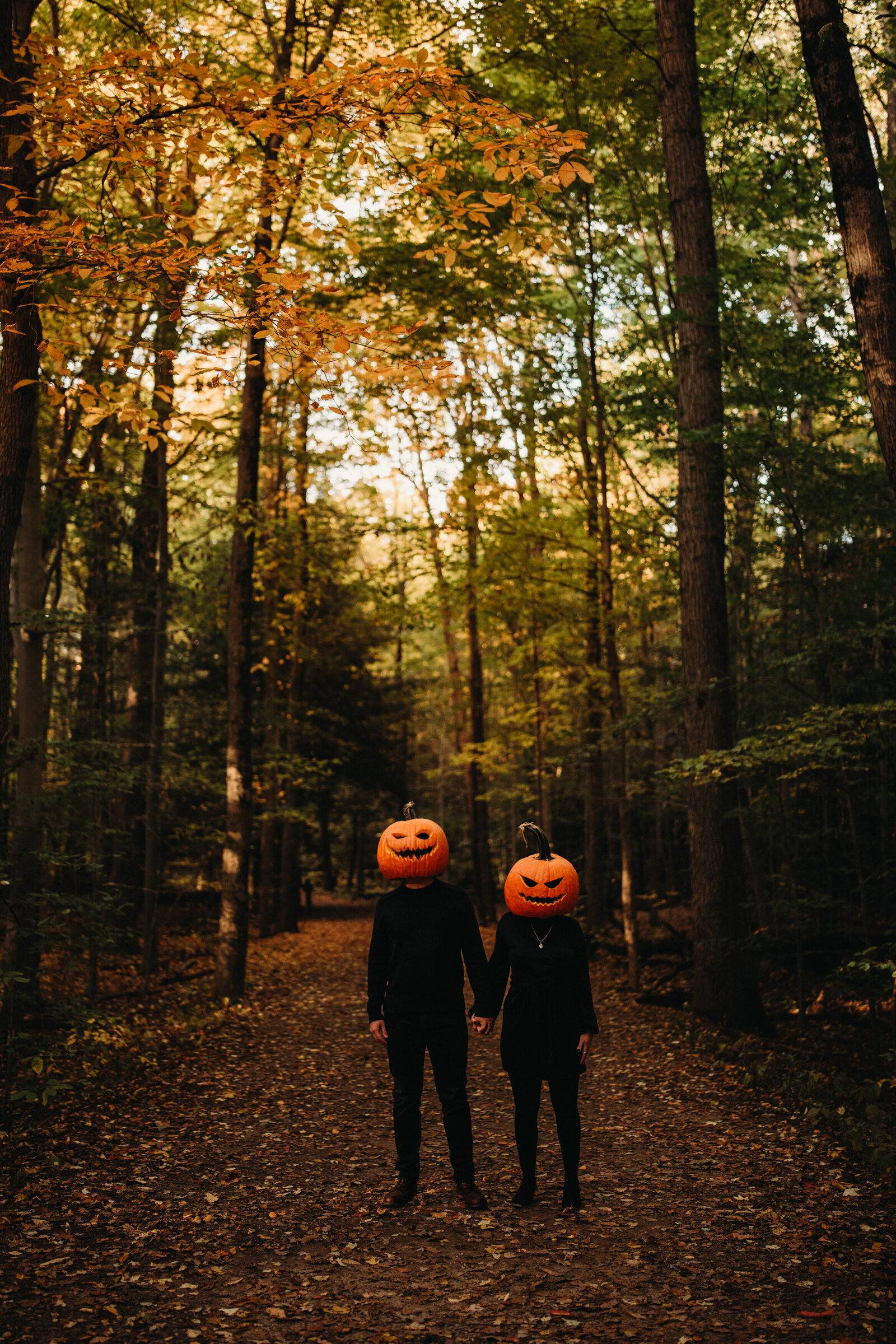 Pumpkin head photo shoot engagment photos in Cuyahoga Valley State Park