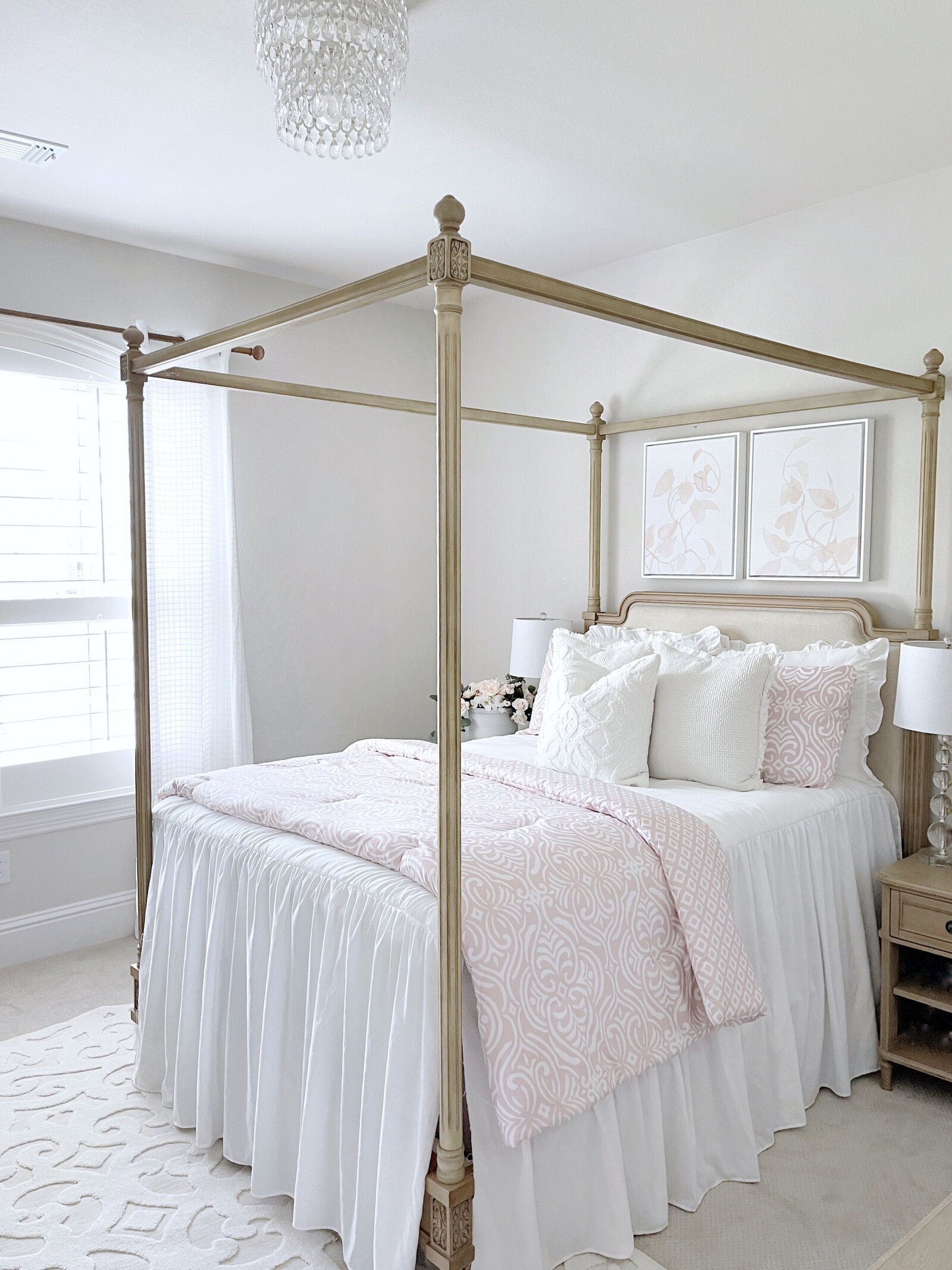 View of a bed with multiple MTH pillows and bedding