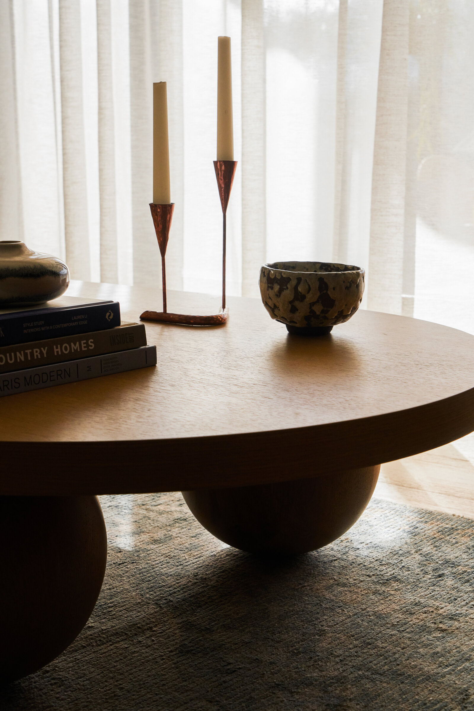 timber coffee table styled with candles