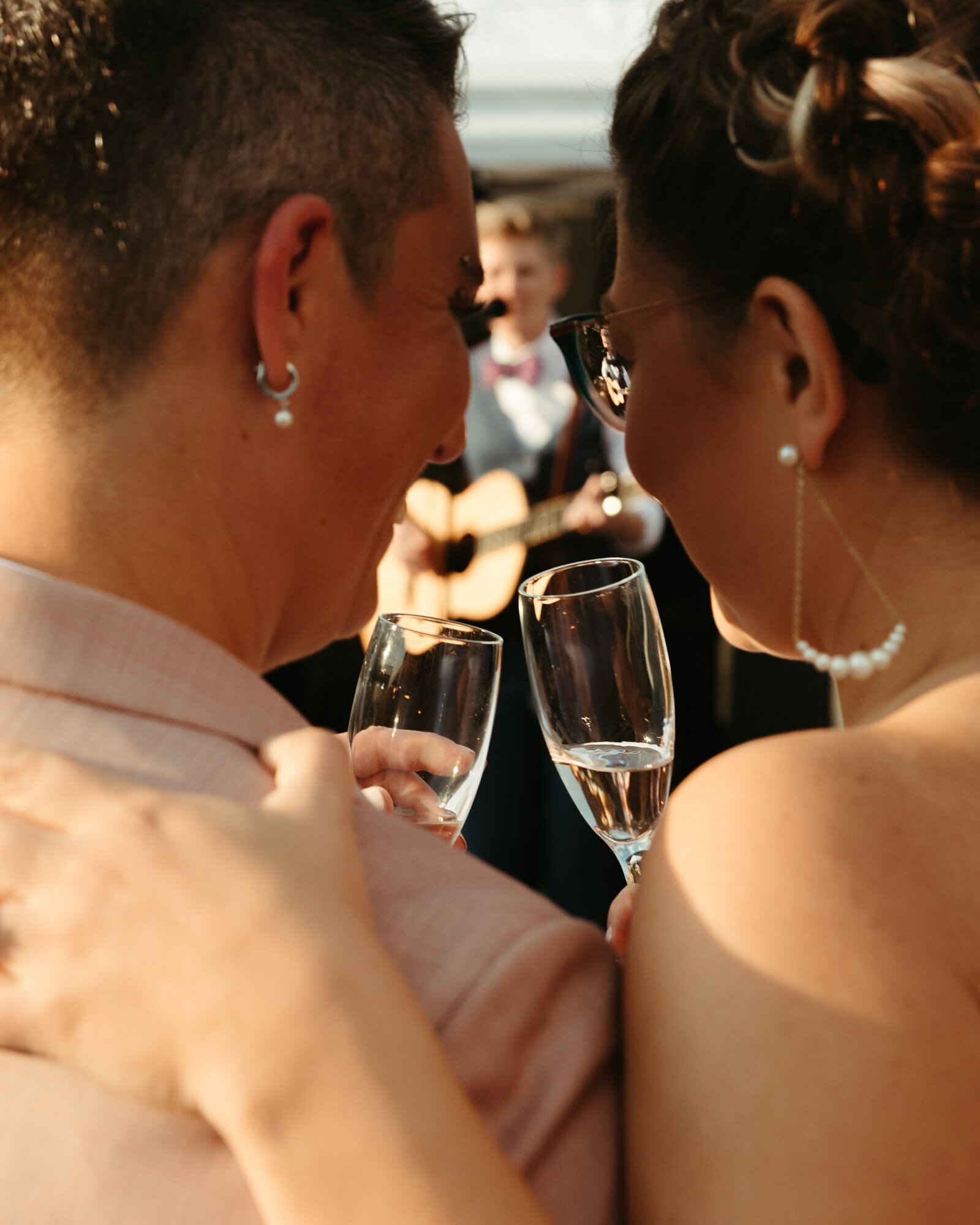 Brides sharing a toast of champaign