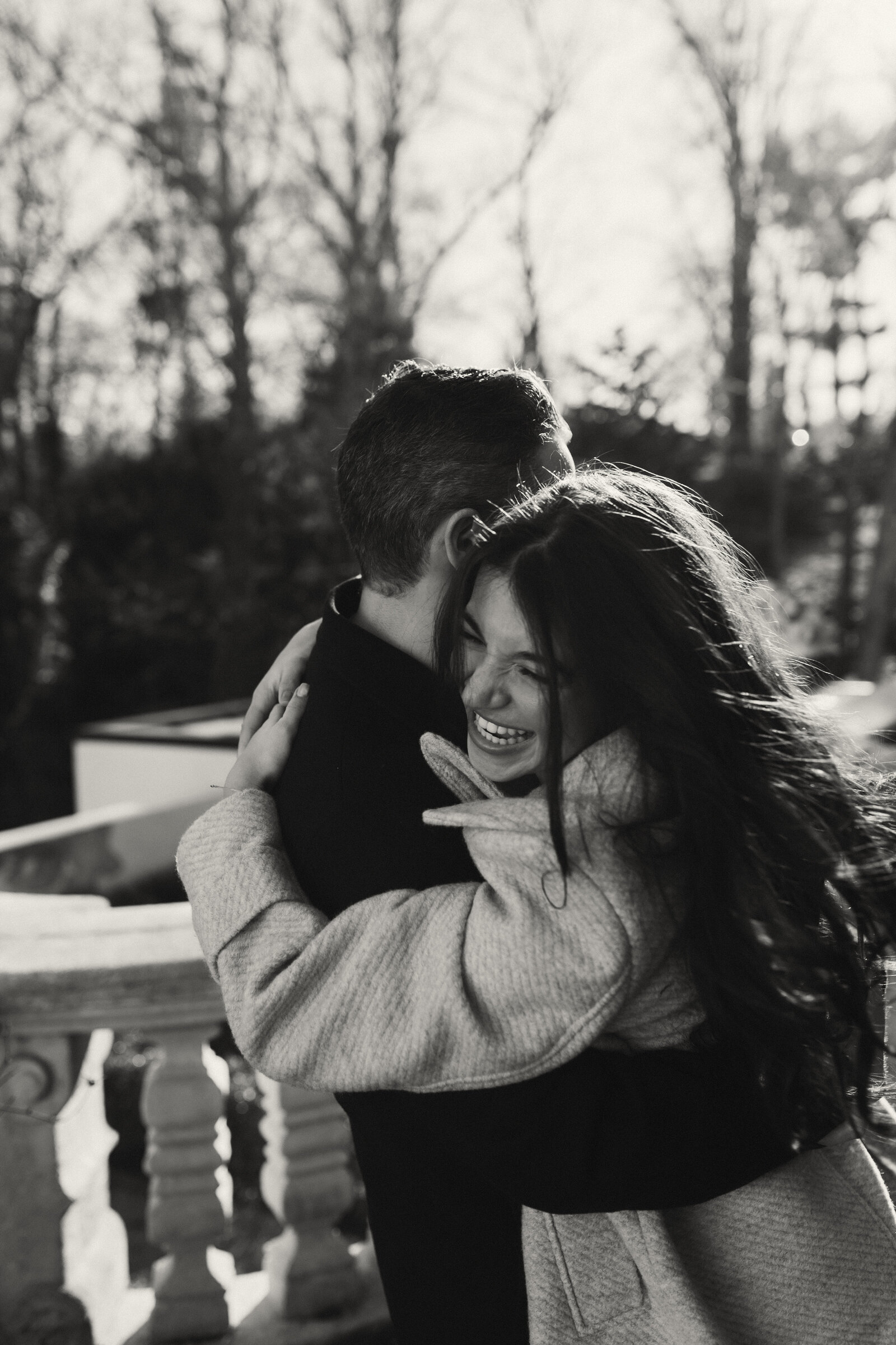 Newly engaged couple in black and white photo at their engagement session at the Vanderbilt Museum  on Long Island | Emma LeeAnn Photography