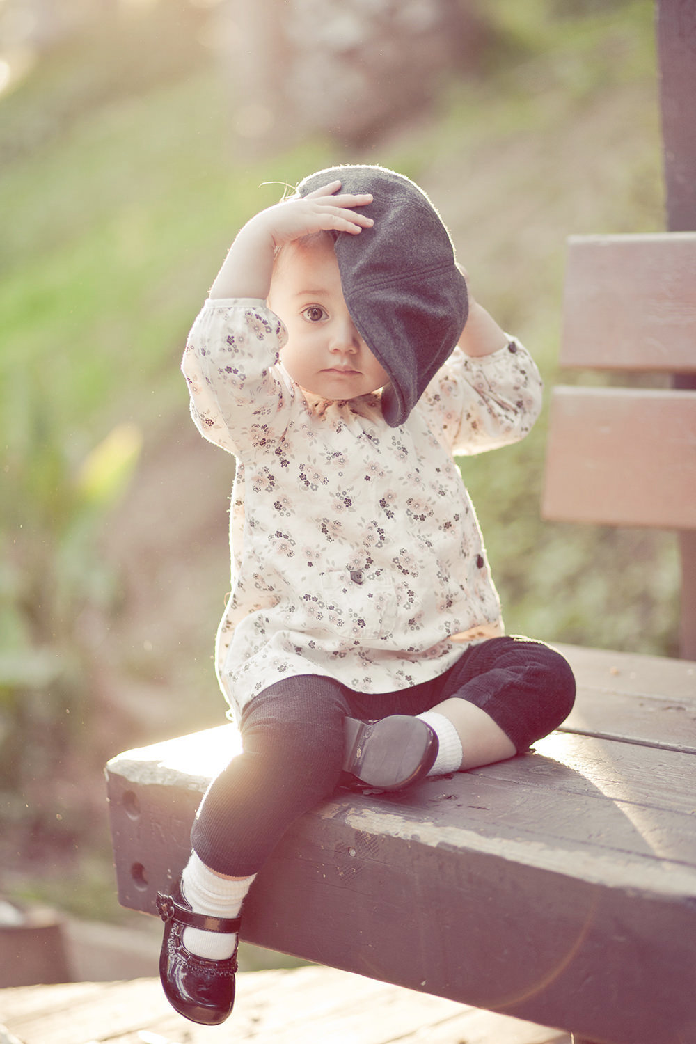 san diego family photographer | little girl vintage with a cute hat on a park bench