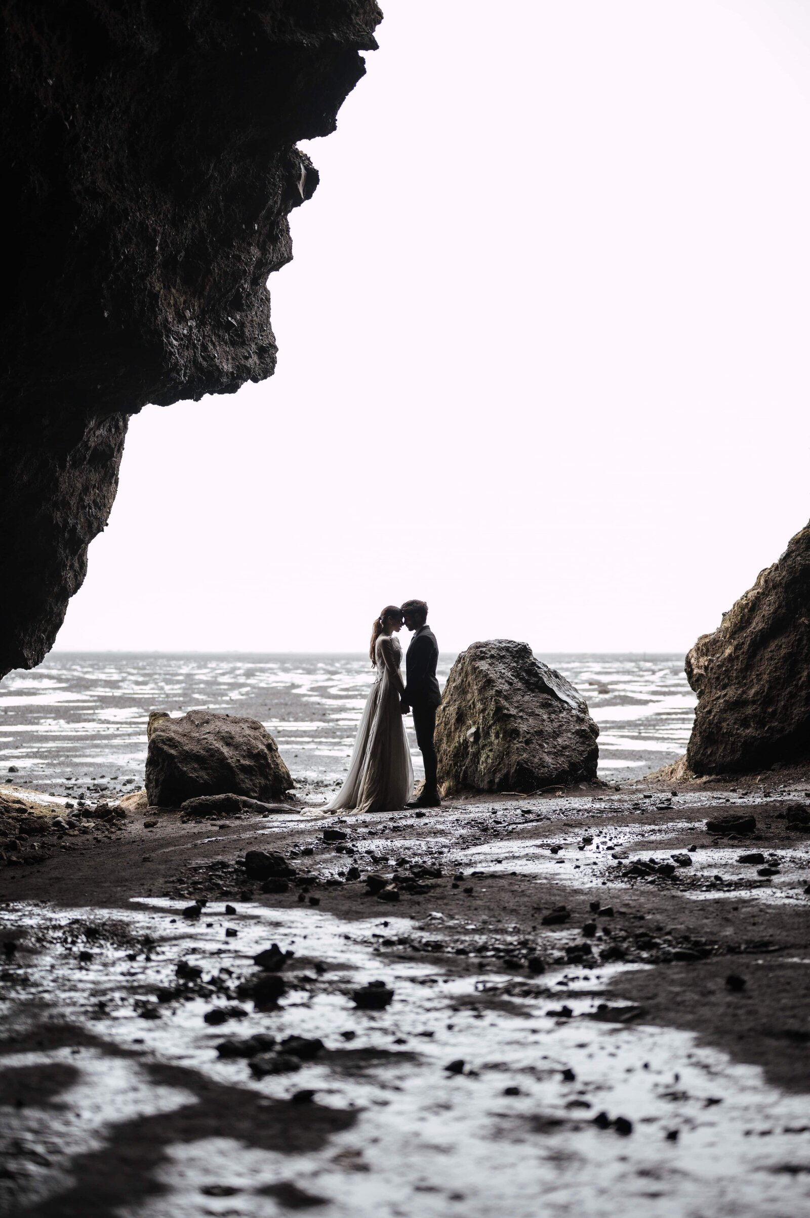 Intimate vows exchanged on a rocky outcrop overlooking the fjords in Iceland