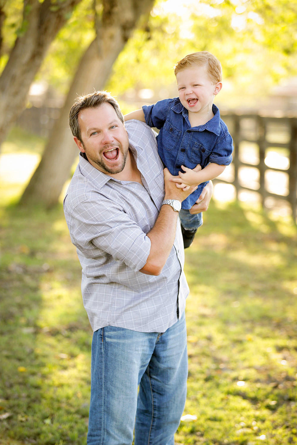 san diego family photography | dad and son laughing at camera
