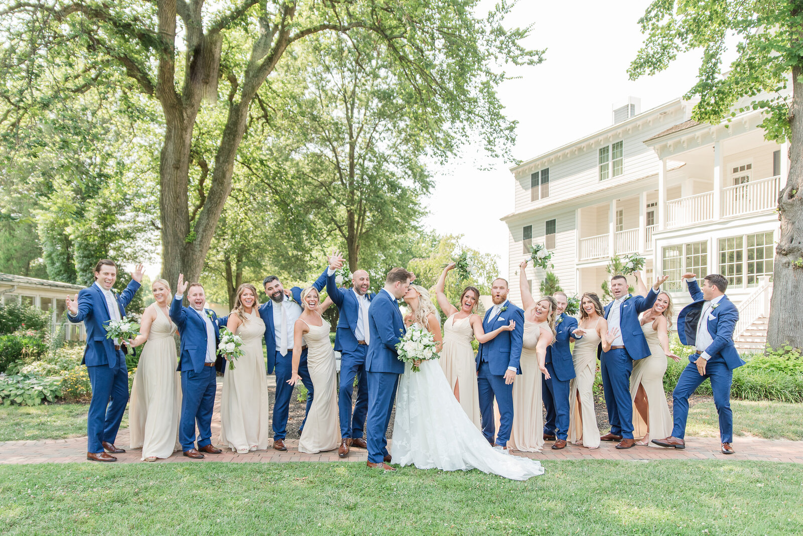 blue sits and champagne bridesmaids dresses wedding party photo