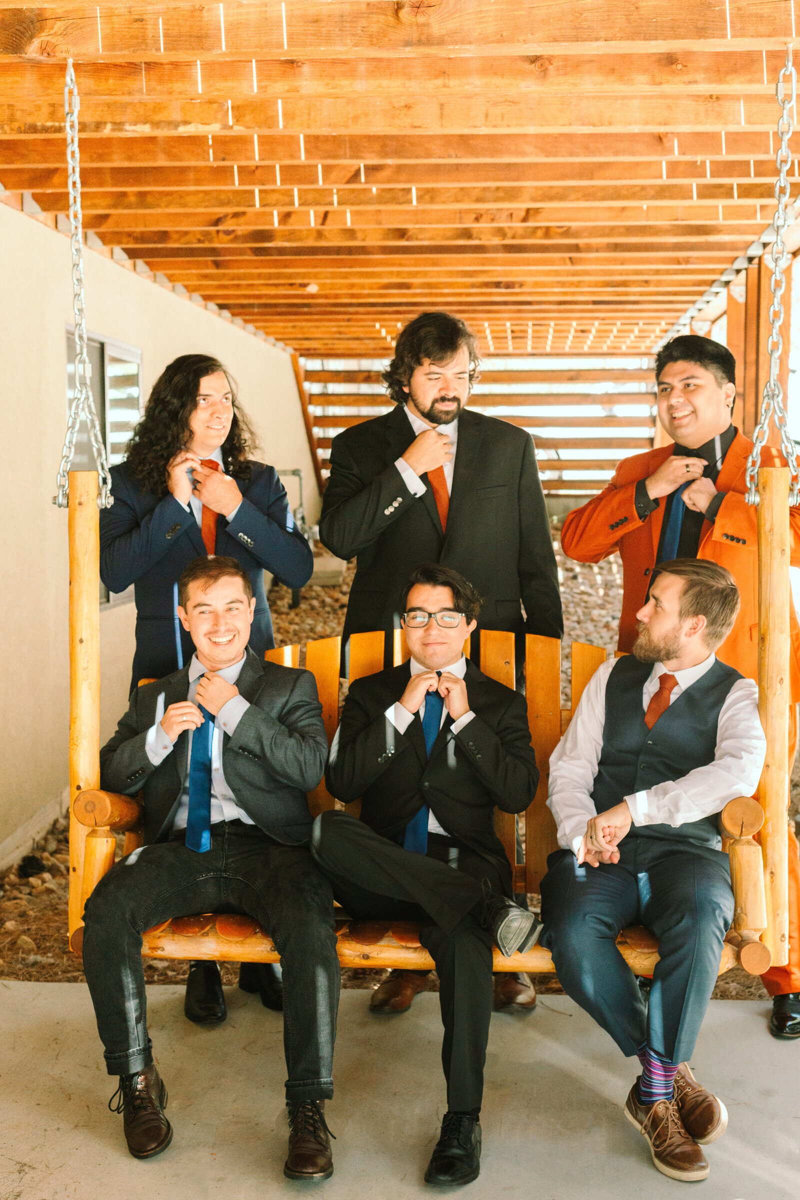 The bridal party celebrates an intimate elopement at a cabin at Big Bear Lake, California.