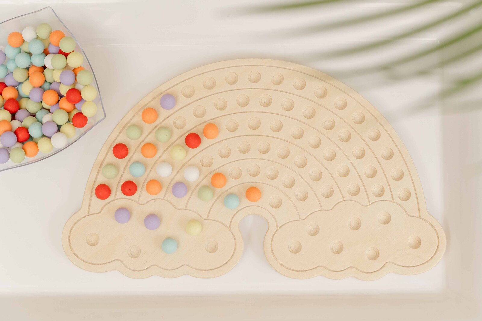 rainbow activity board during product photo in Vienna,Virginia
