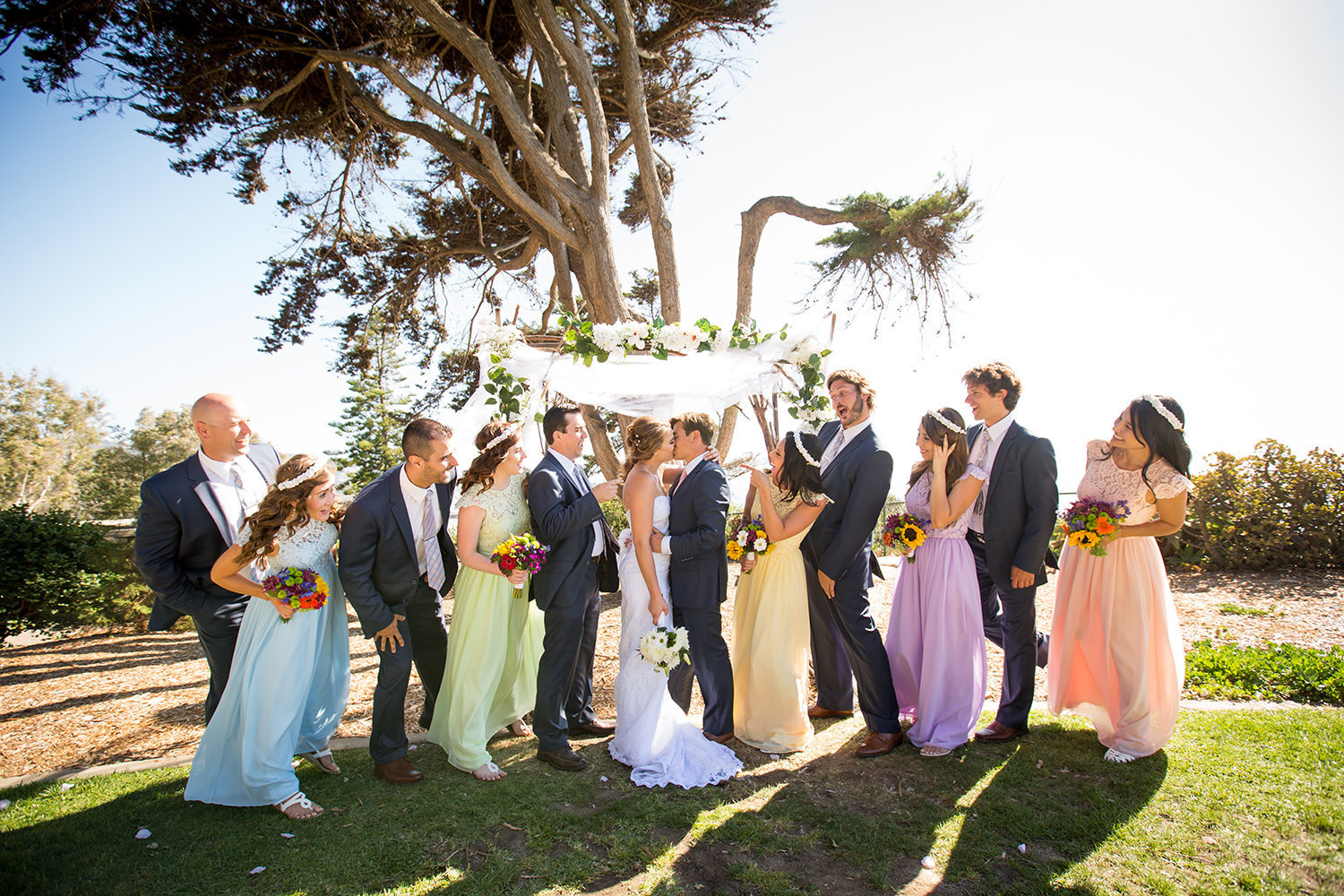bridal party with multi color dresses