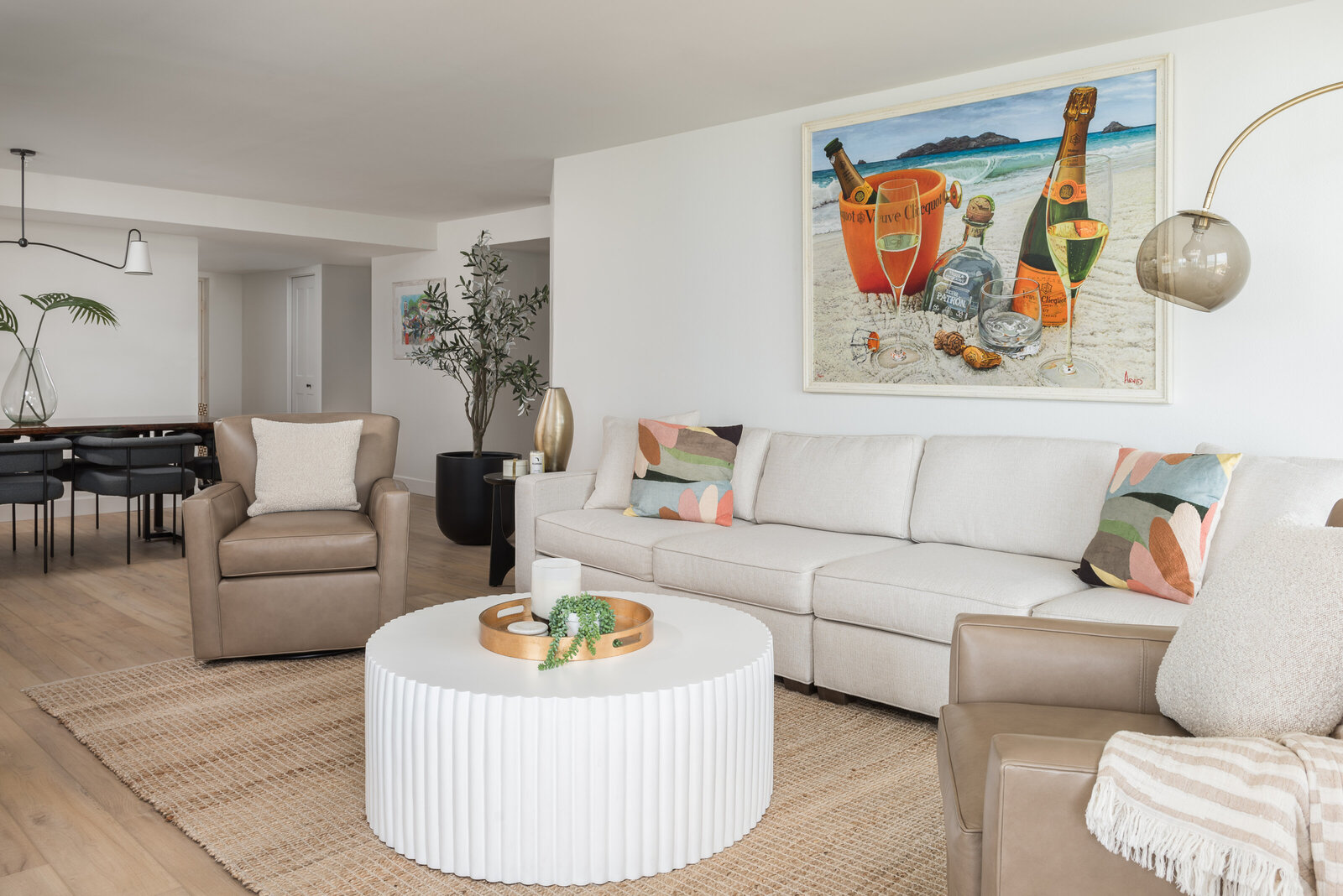 White couch and featured art at Always on Vacay condo_Scarbro Design