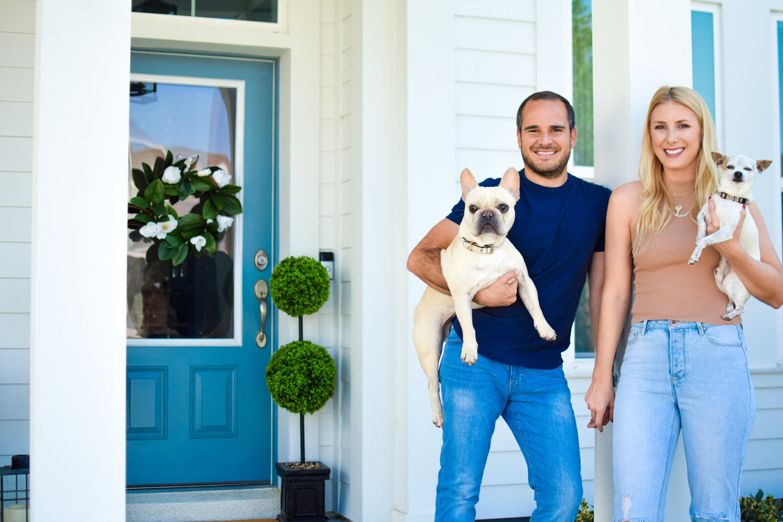 Couple & dogs blue door Front Porch Project Oakland Florida