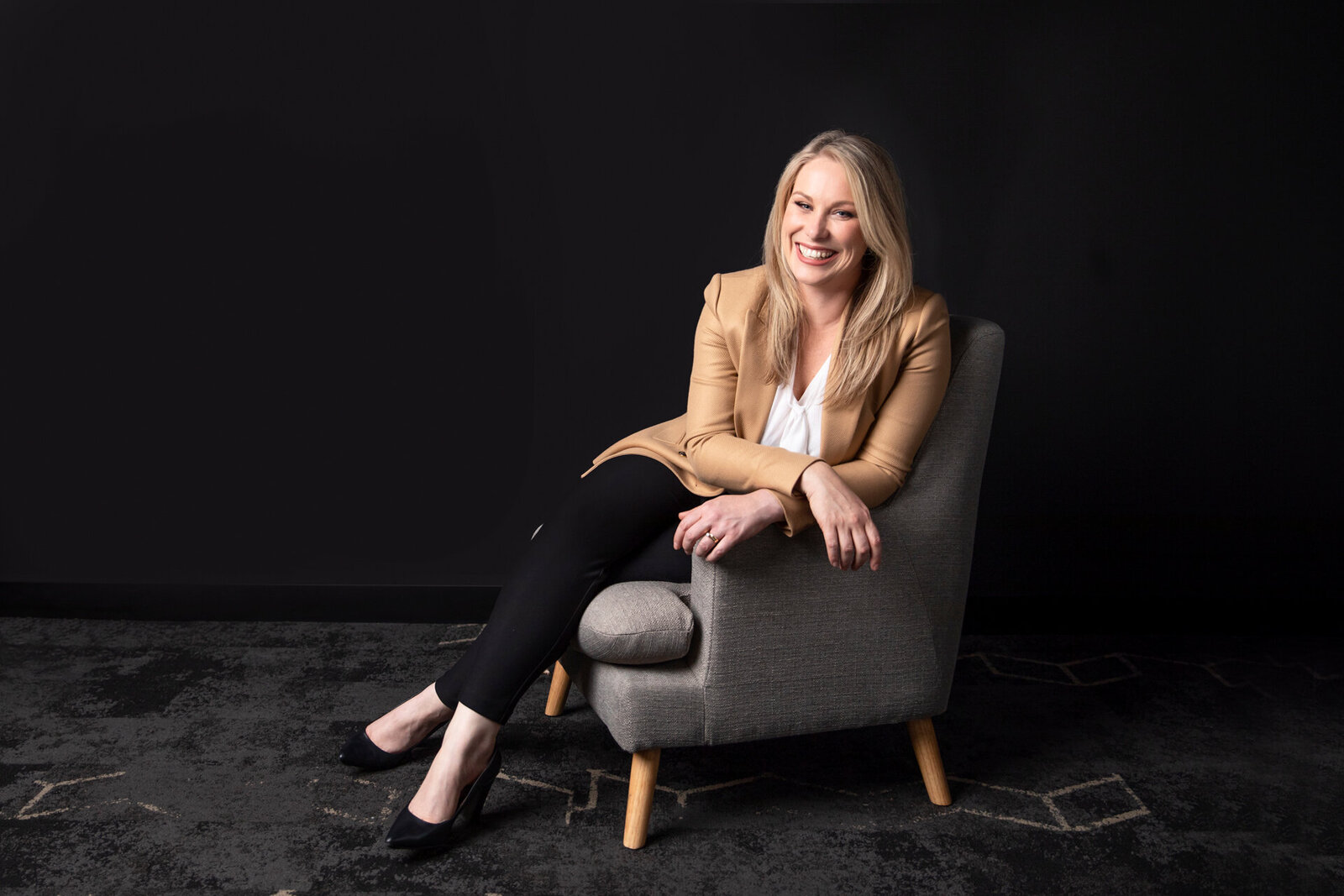 Business woman sitting in a chair