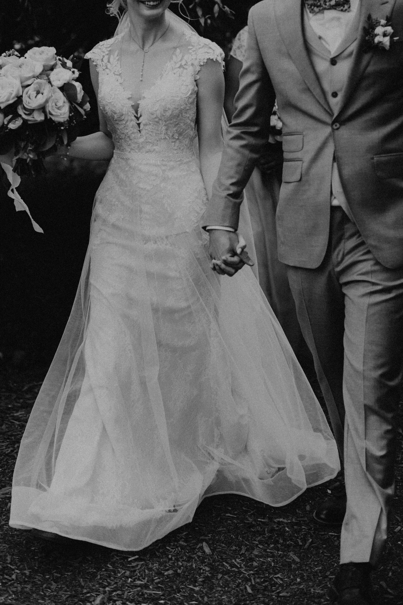 Calgary bride and groom walking hand in hand