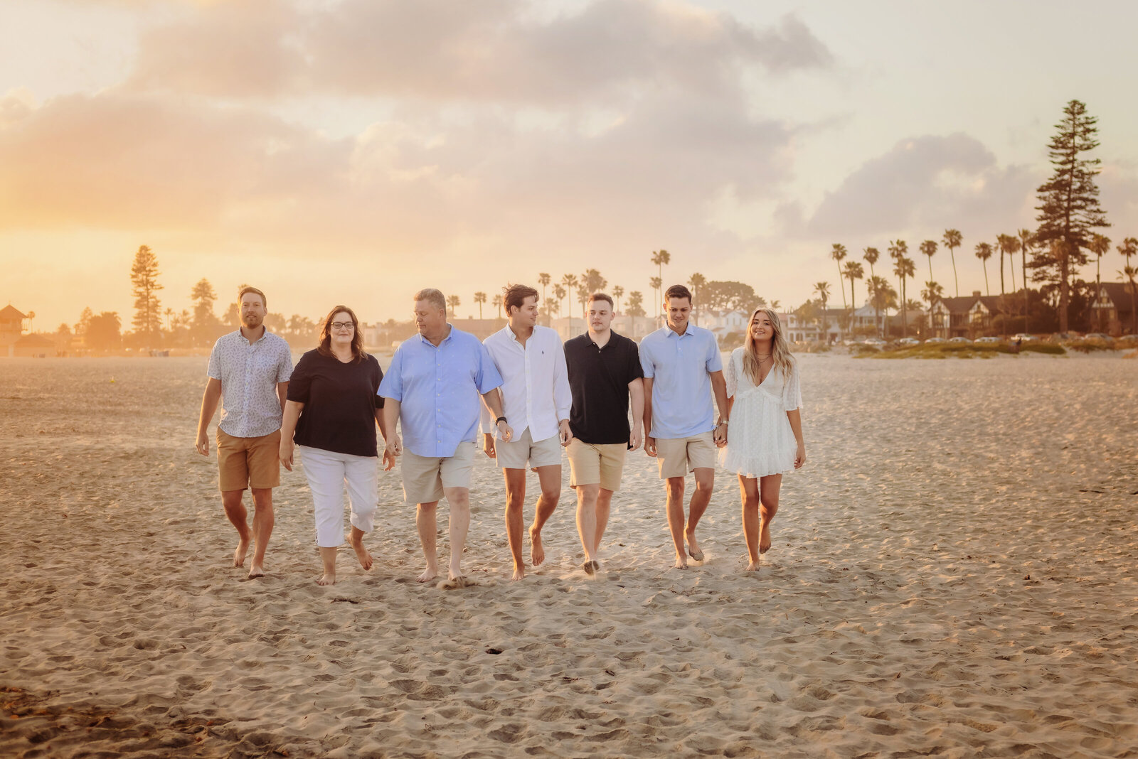 Family Photographer, a group of older siblings in their twenties and thirties walk together