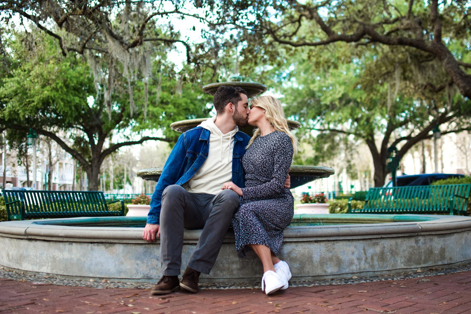 Couple Engagement Kissing Fountain Celebration Florida