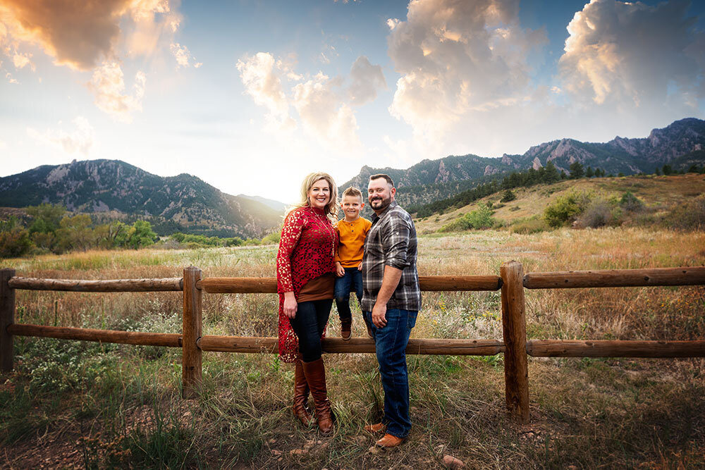 south-mesa-trail-boulder-trailhead-family-sunset-mountains-fence-dreamy-sky-colorful-family-pictures