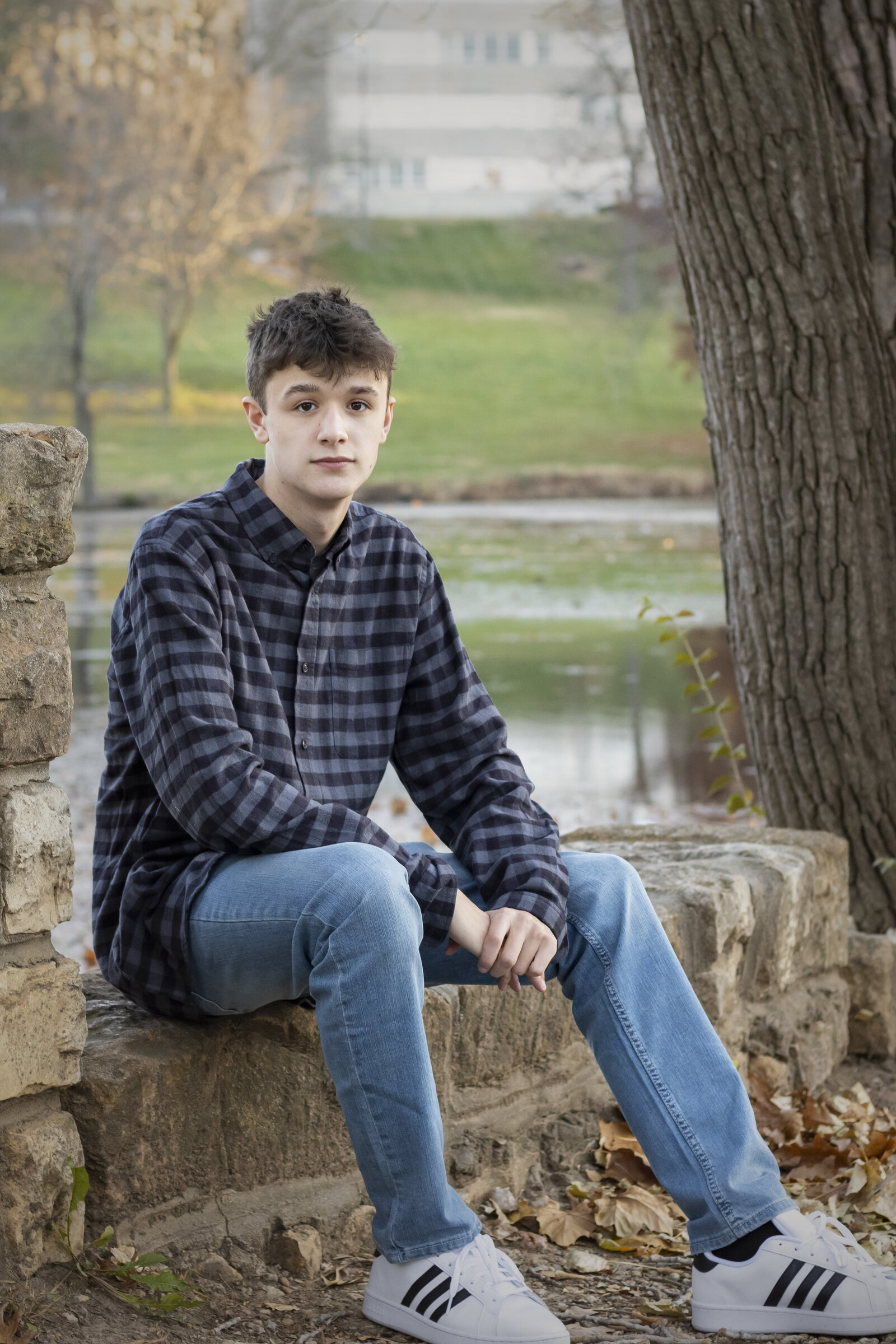 Guy senior session at the Potters Lake in Lawrence University of Kansas campus.