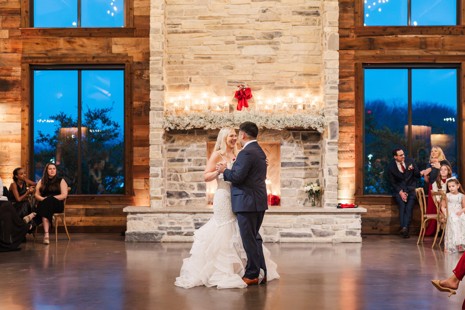 Candid photography while couples first dance at the reception
