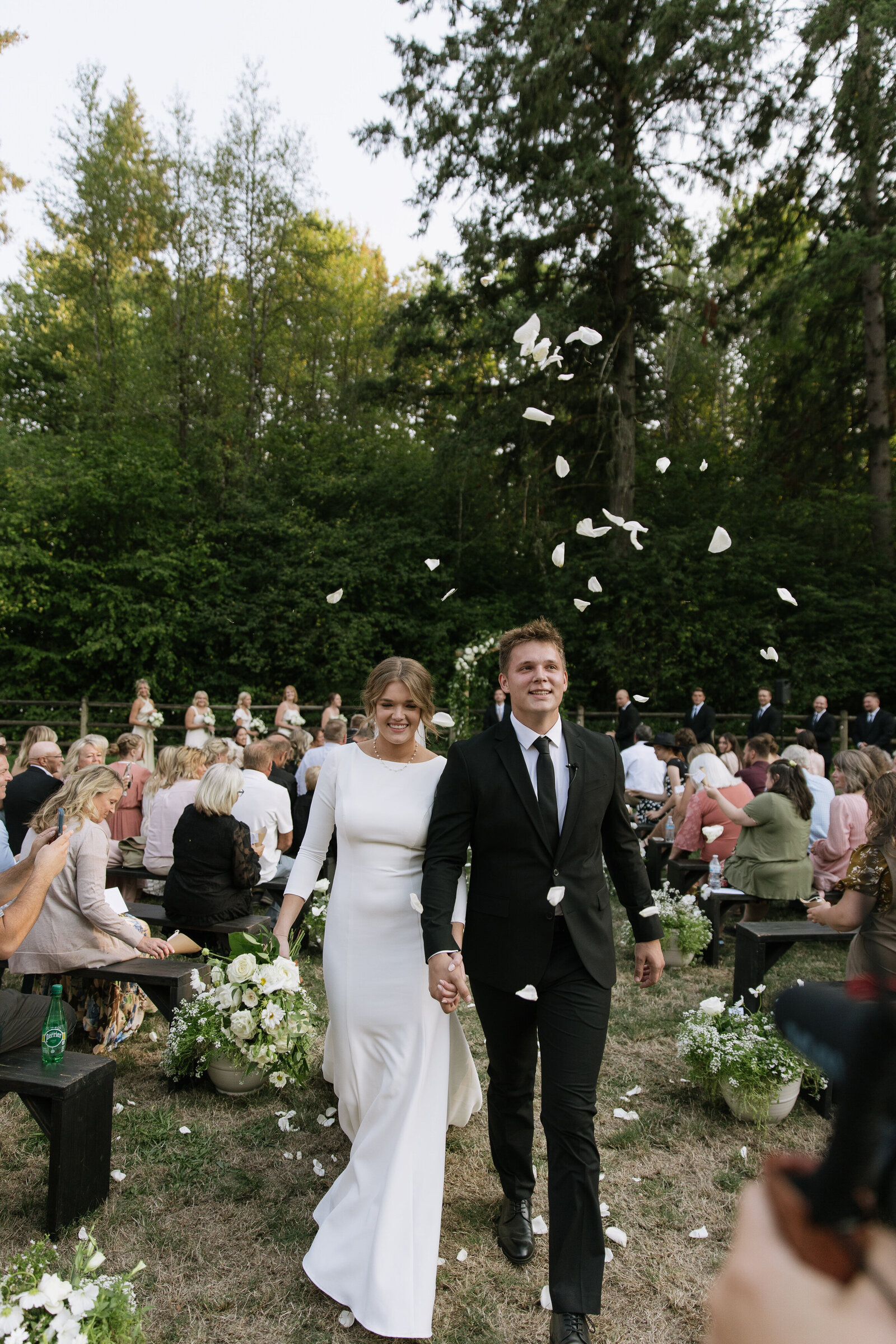 Bride and groom laughing together by Washington adventure elopement photographer