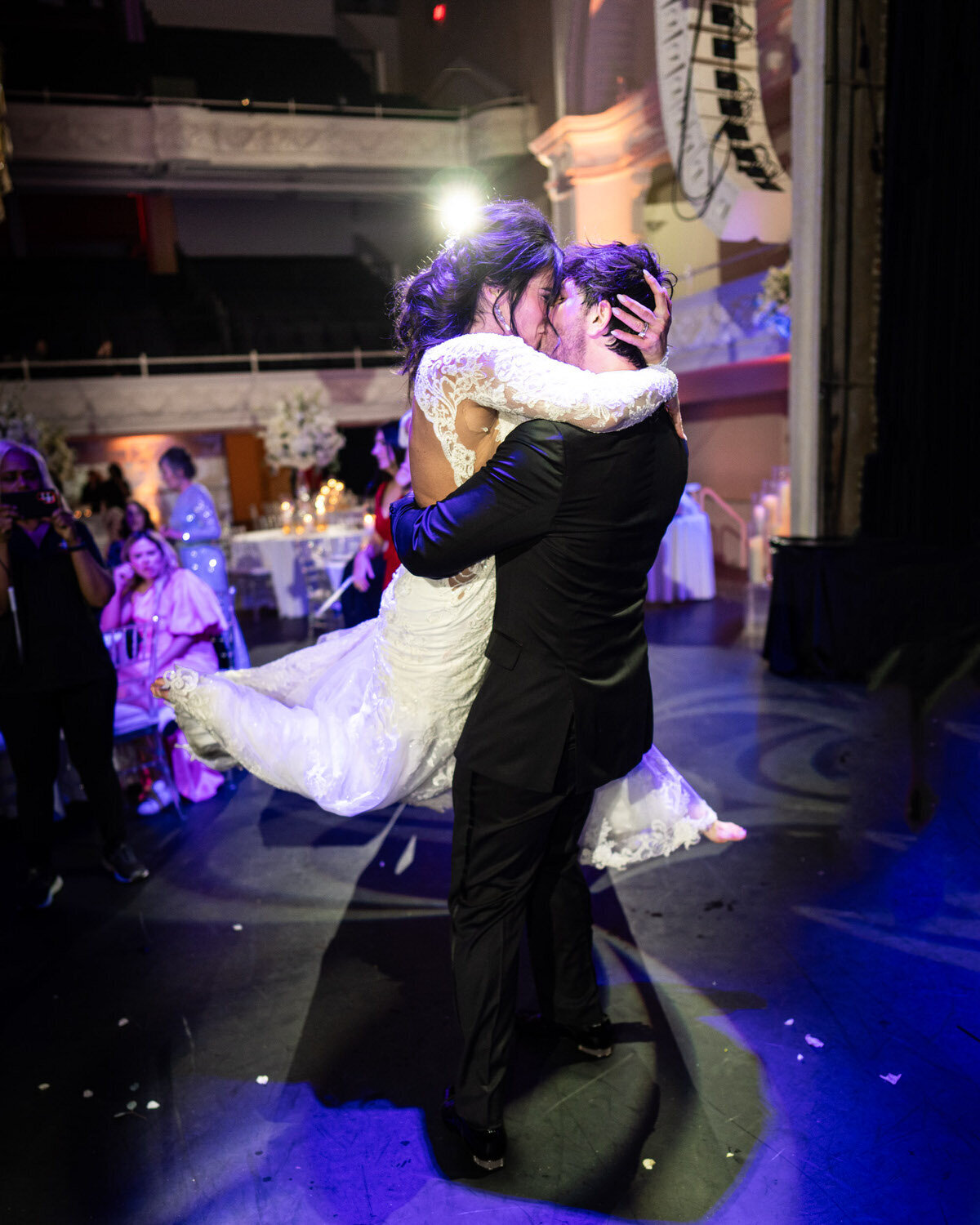 groom-spins-bride-civic-theatre-wedding-4x5