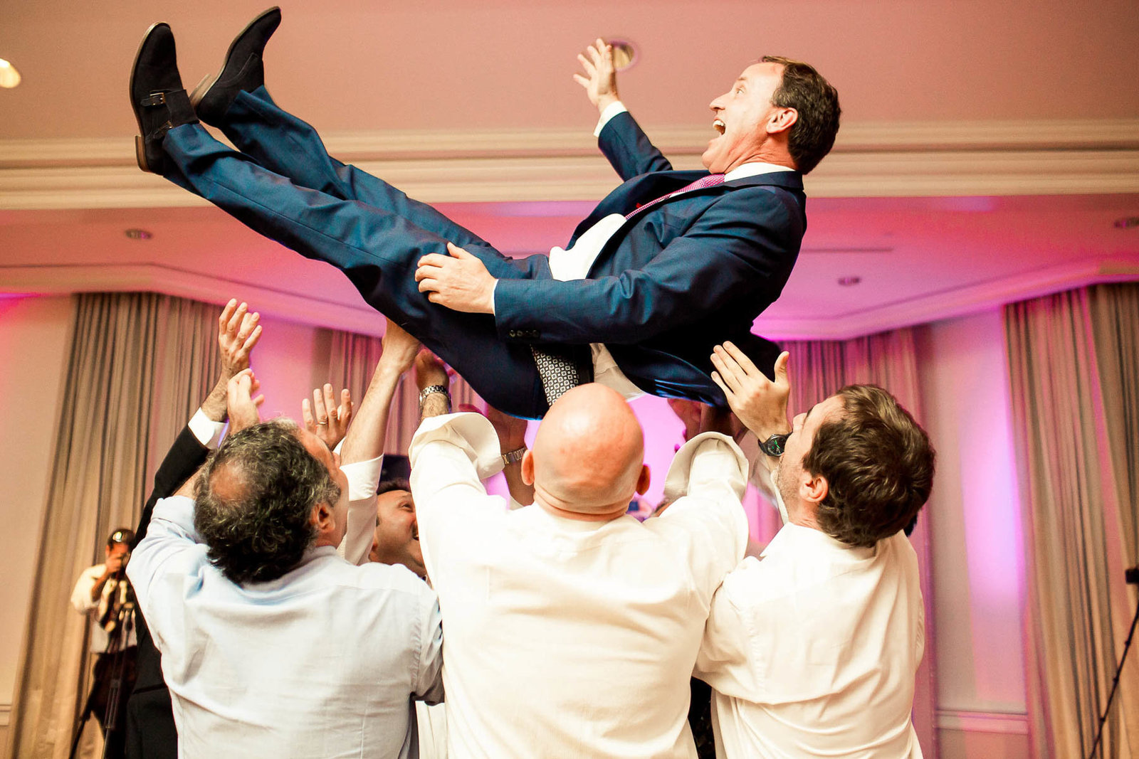 Guests are tossed in the air at reception, Daniel Island Club, Charleston, South Carolina