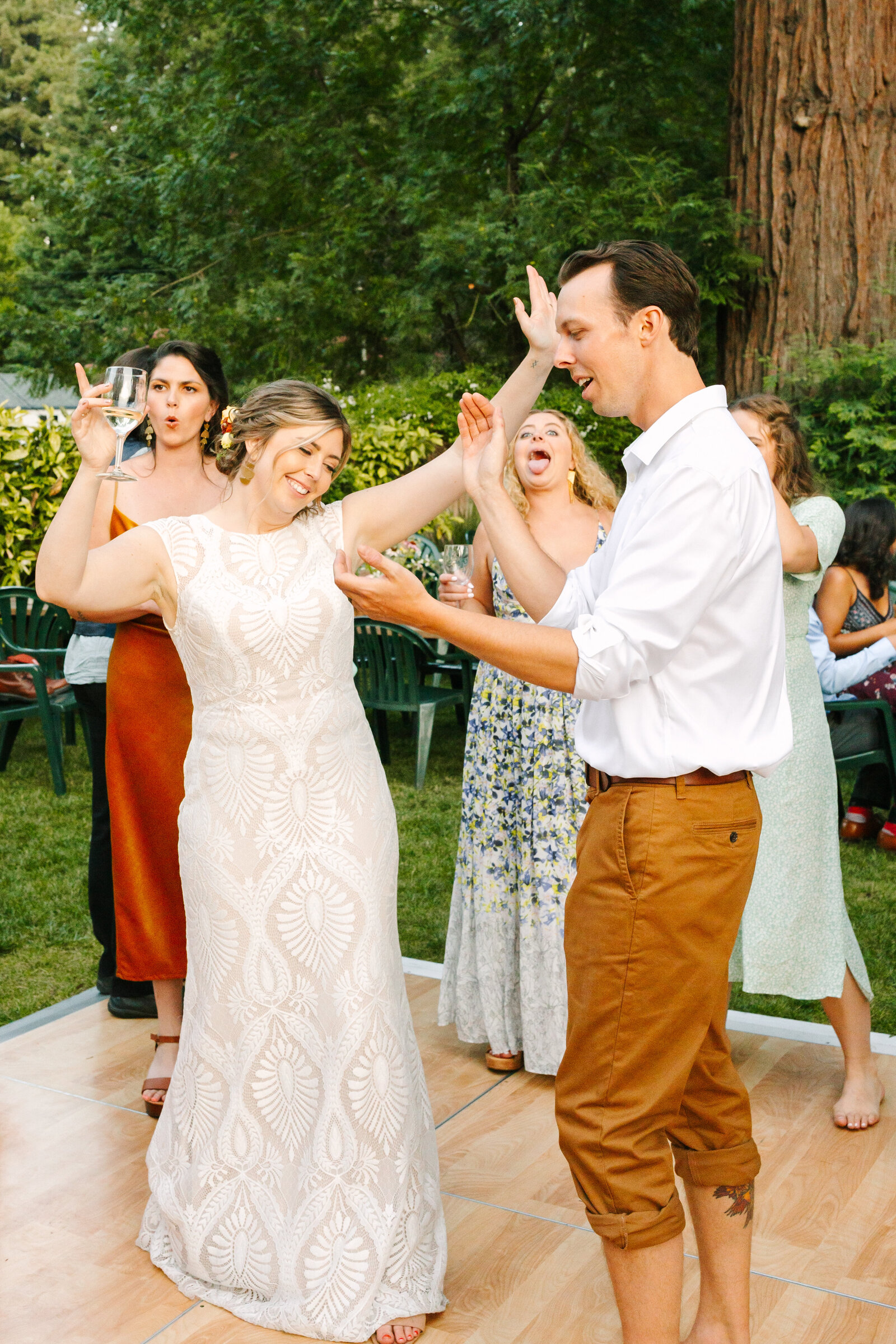 Colorful wedding reception in Santa Cruz, California in the redwood trees.