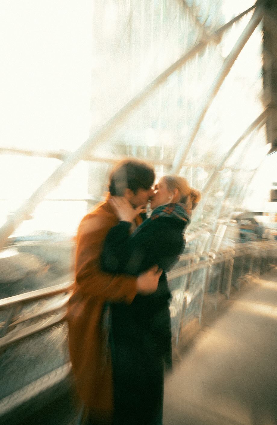 Couple kissing in Downtown Pittsburgh Engagement