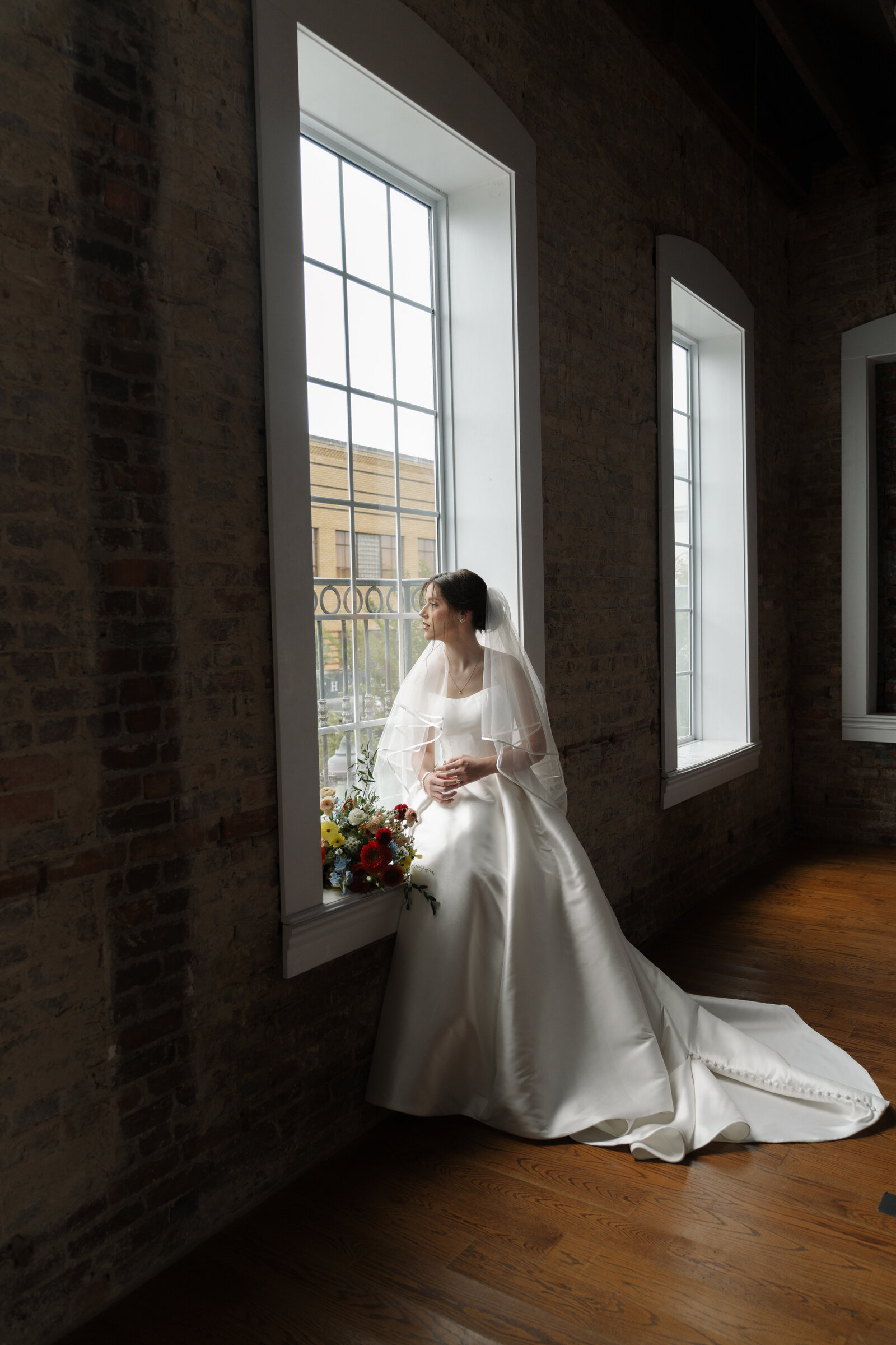 bride looking out of a window