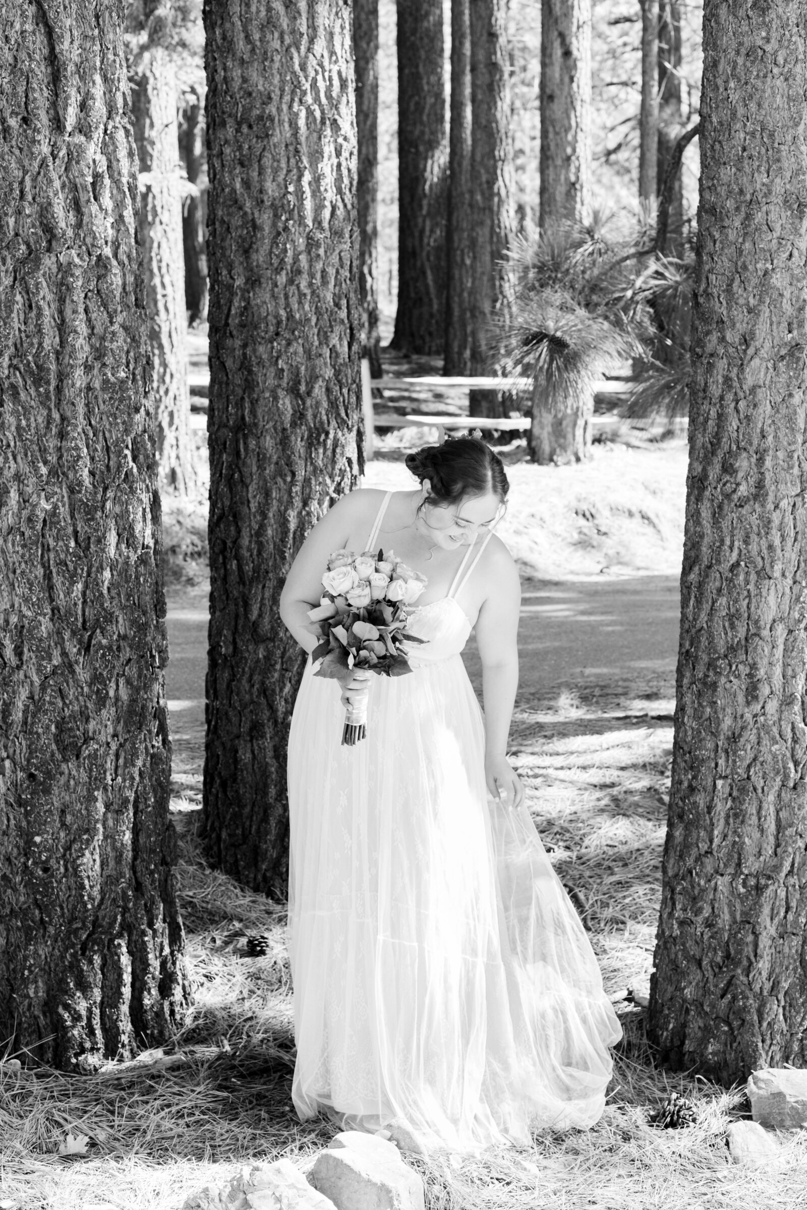 A boho bride celebrates her intimate elopement at a cabin at Big Bear Lake, California.
