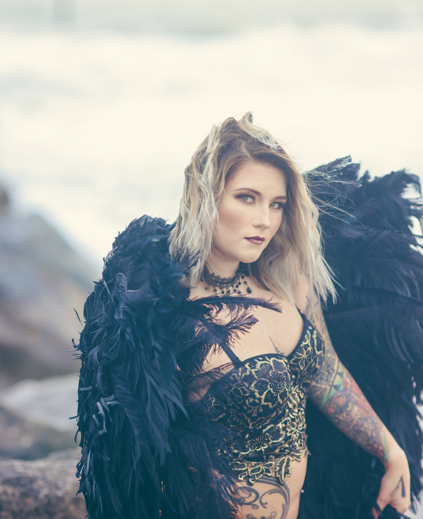 Woman wearing black angel wings