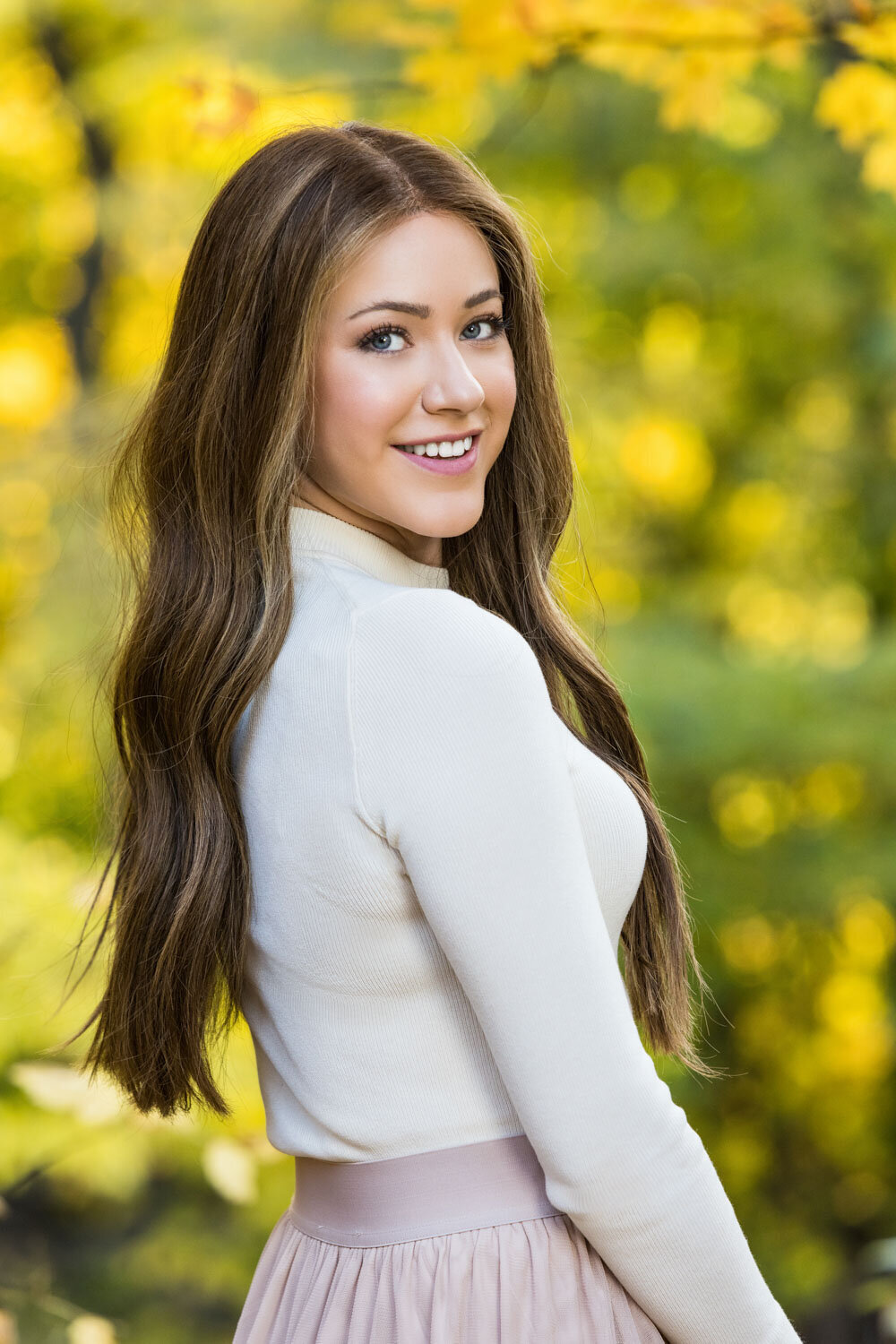 woman with long hair beautifully smiling