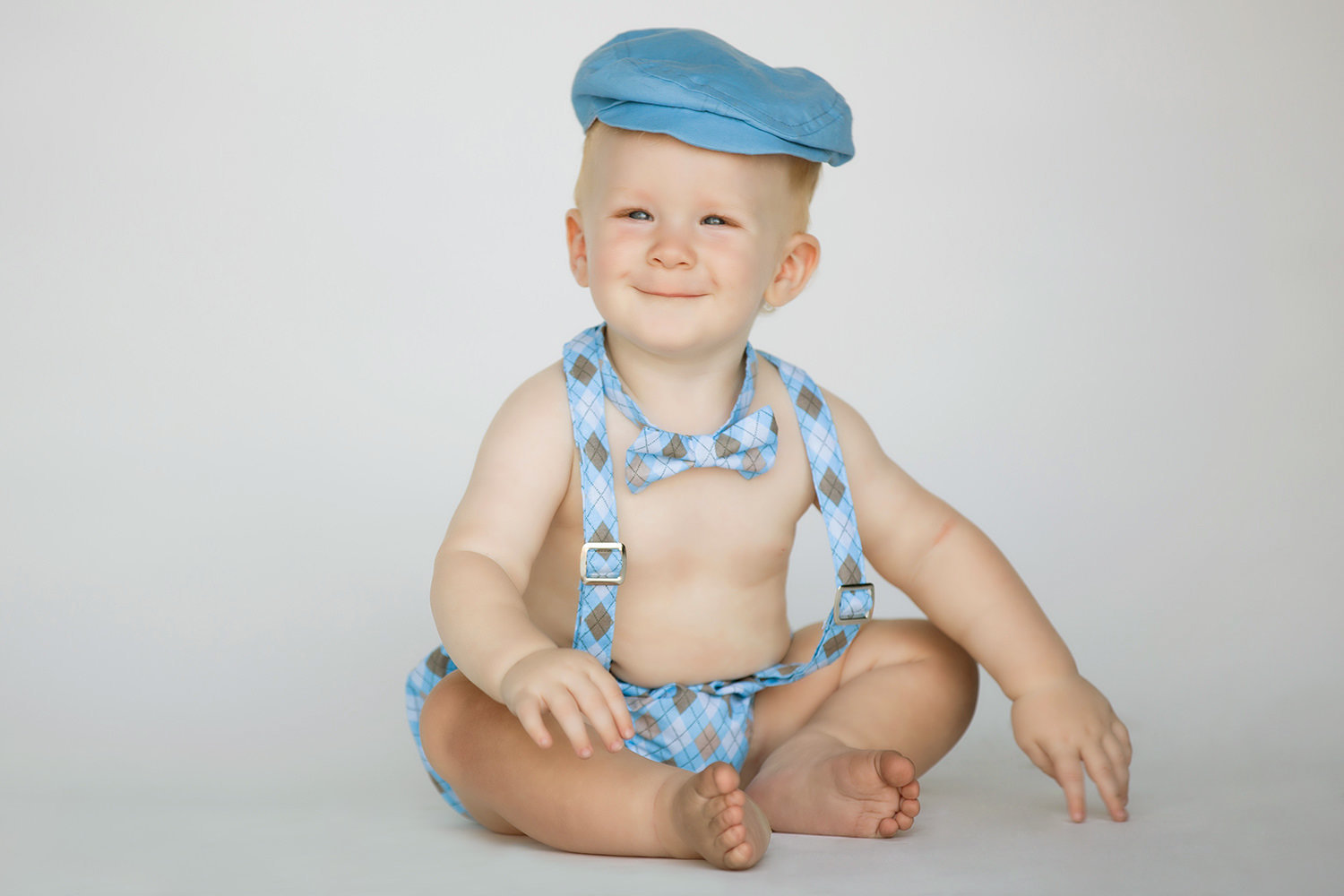 san diego family photographer | little boy with bowtie and suspenders cute blue hat