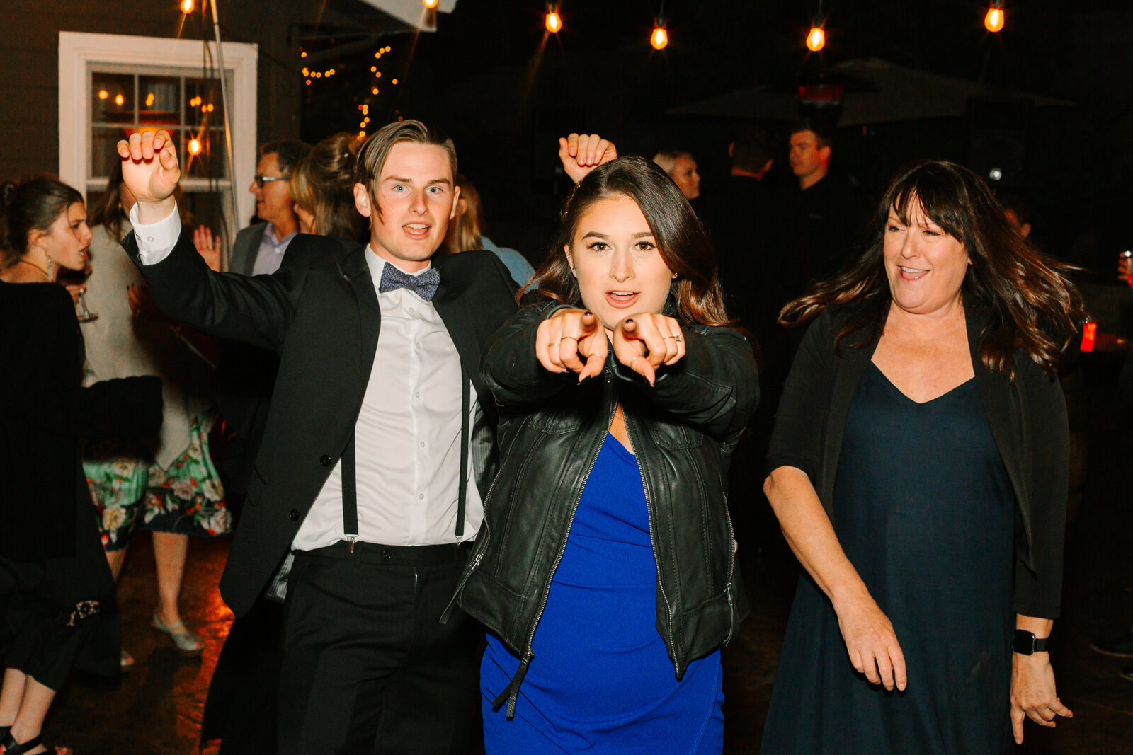 Wedding guests dancing.