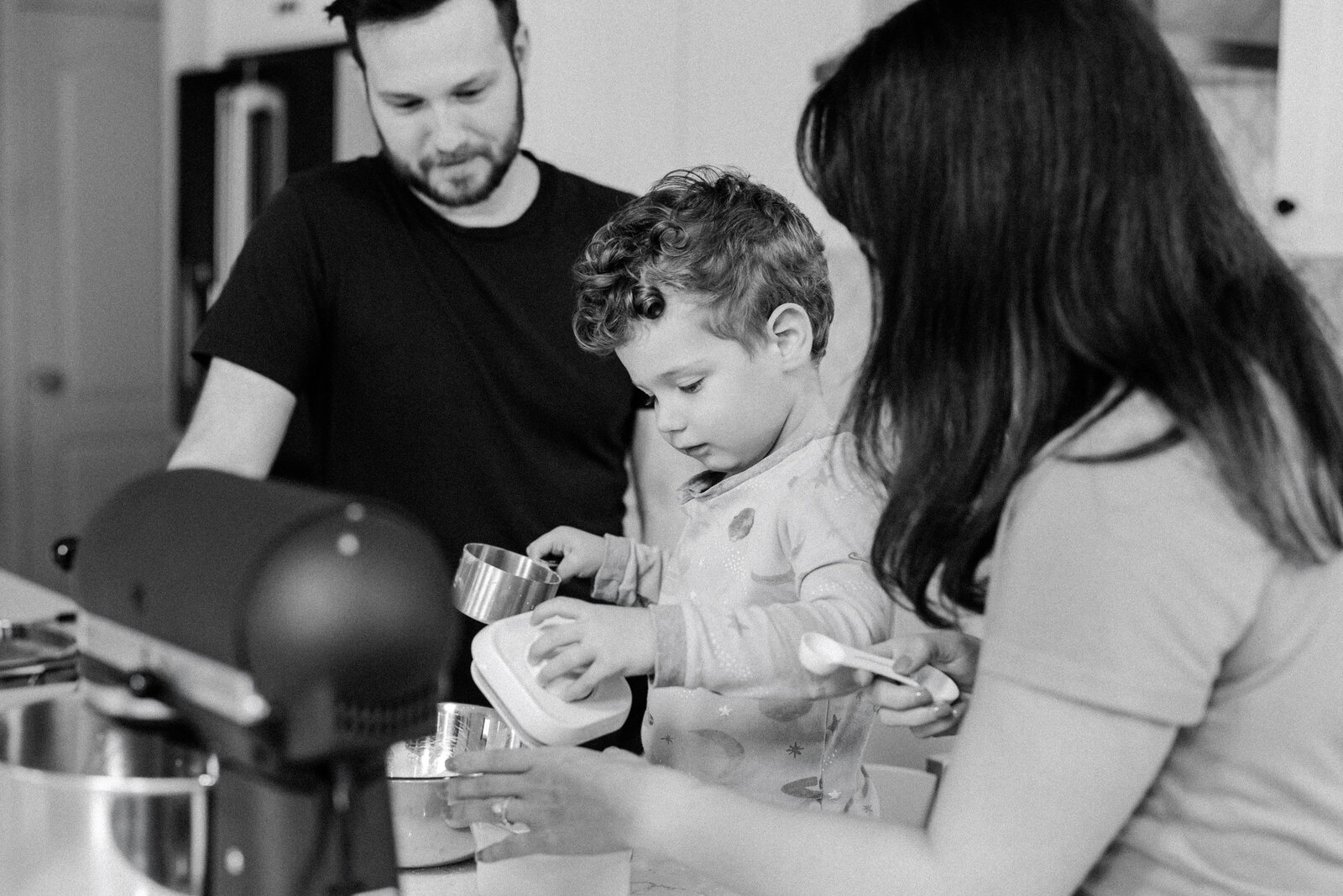 Family bakes together during their Saturday morning family session