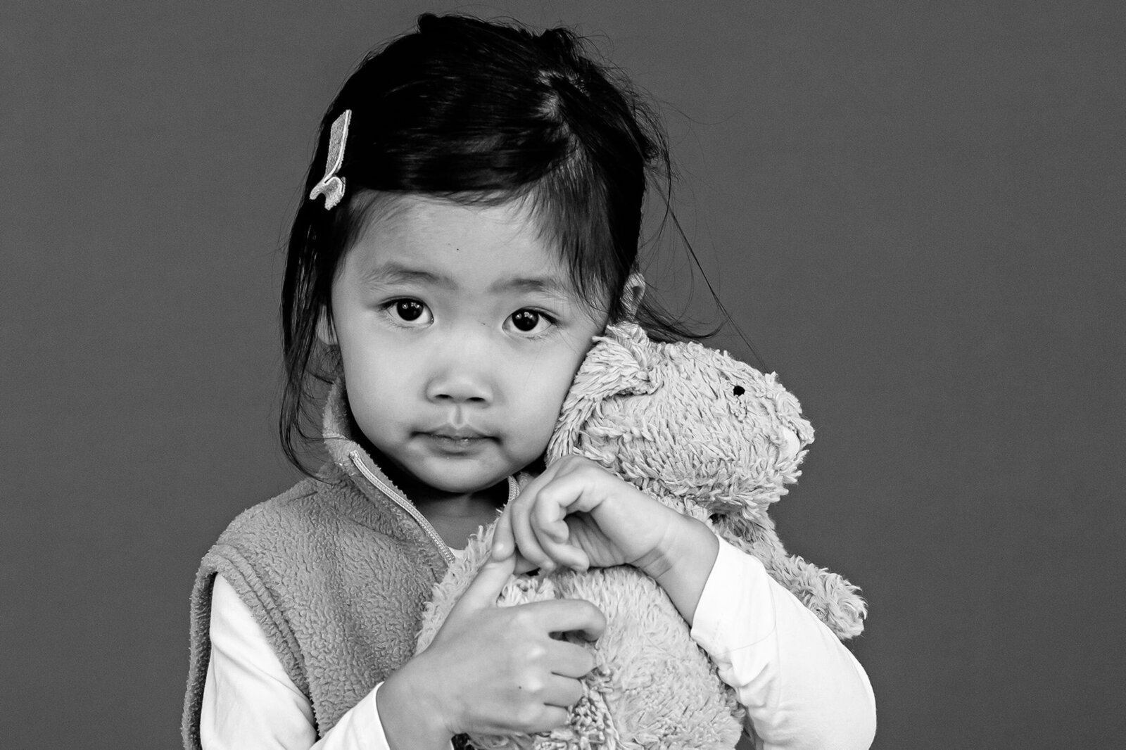 Candid moment of a child during a school photography session in Richmond