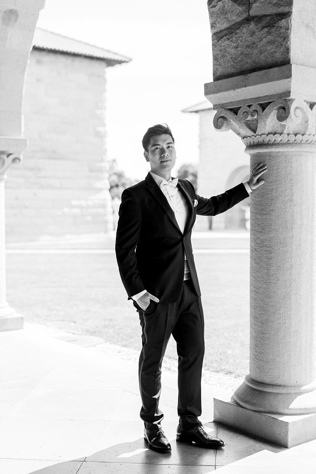A stylish portrait of the groom, exuding confidence and charm at Stanford University.