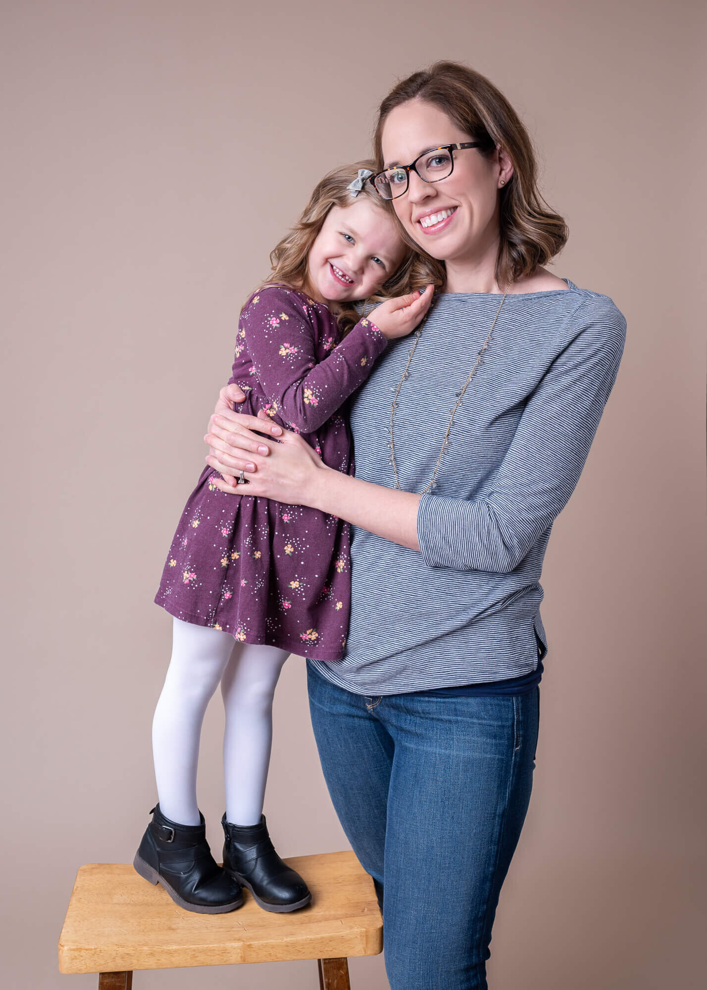 Mother and daughter portrait in studio