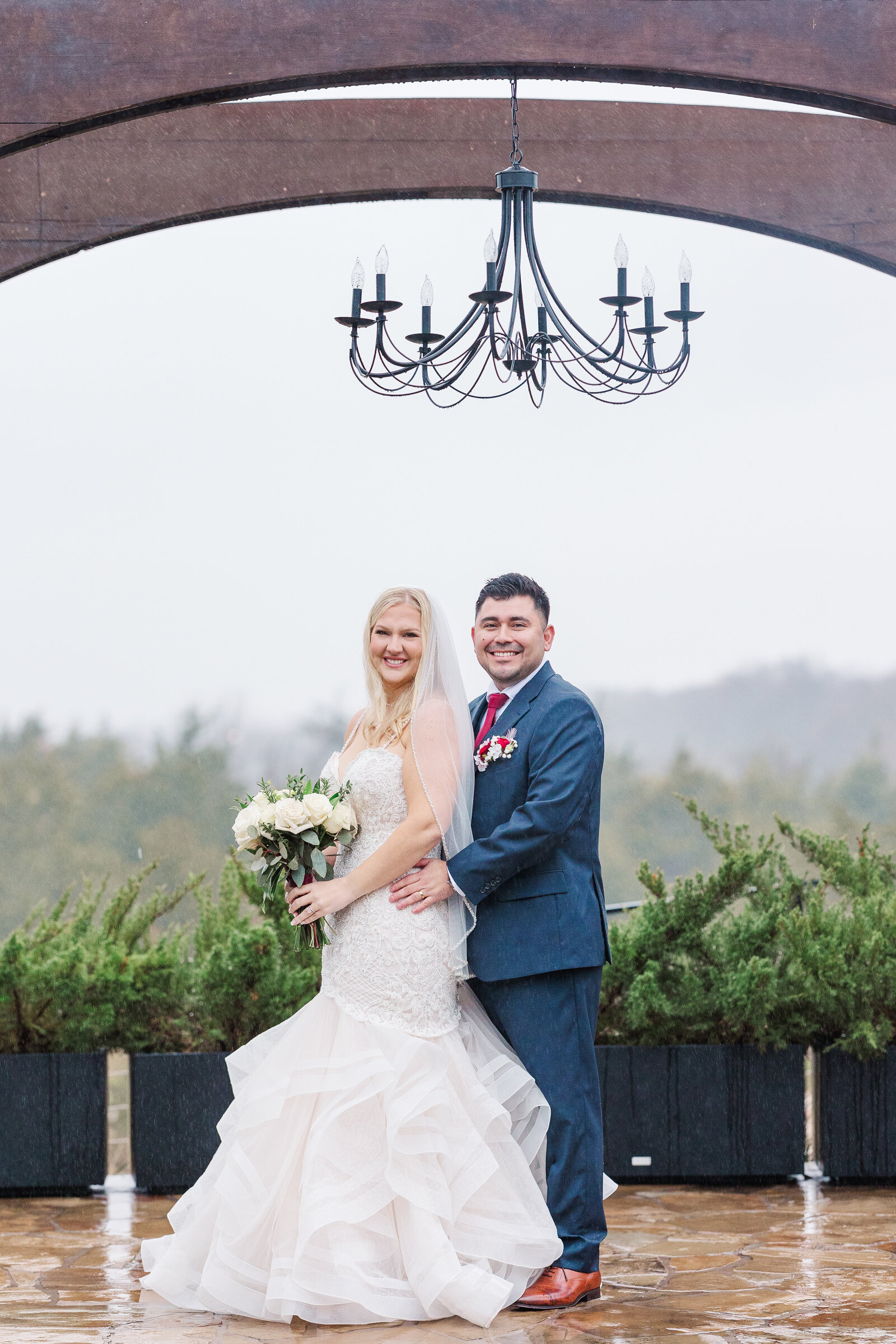 Posed couple portrait session for bride and groom after ceremony