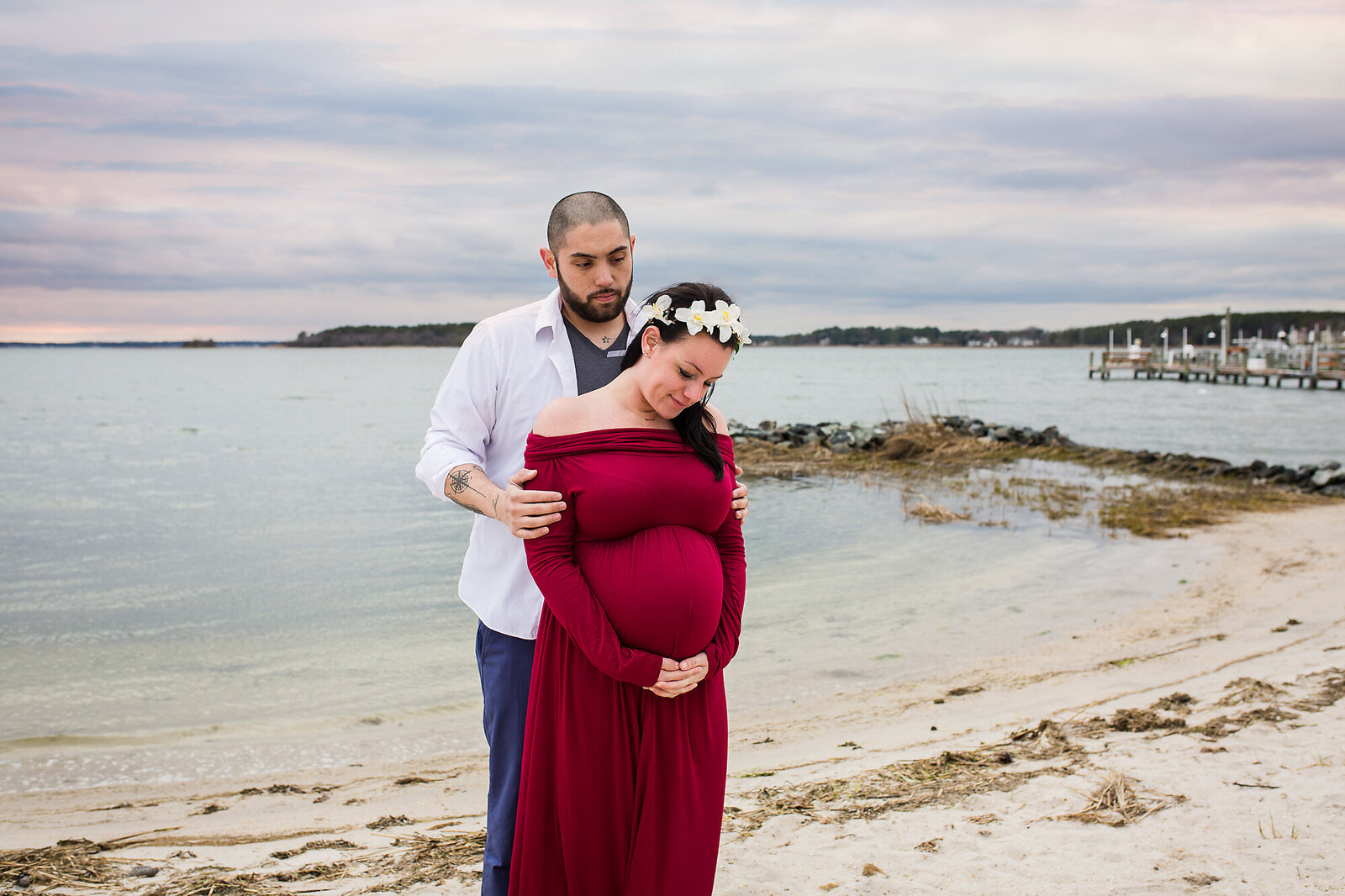 pregnant couple on the beach by PHILADELPHIA MATERNITY PHOTOGRAPHER