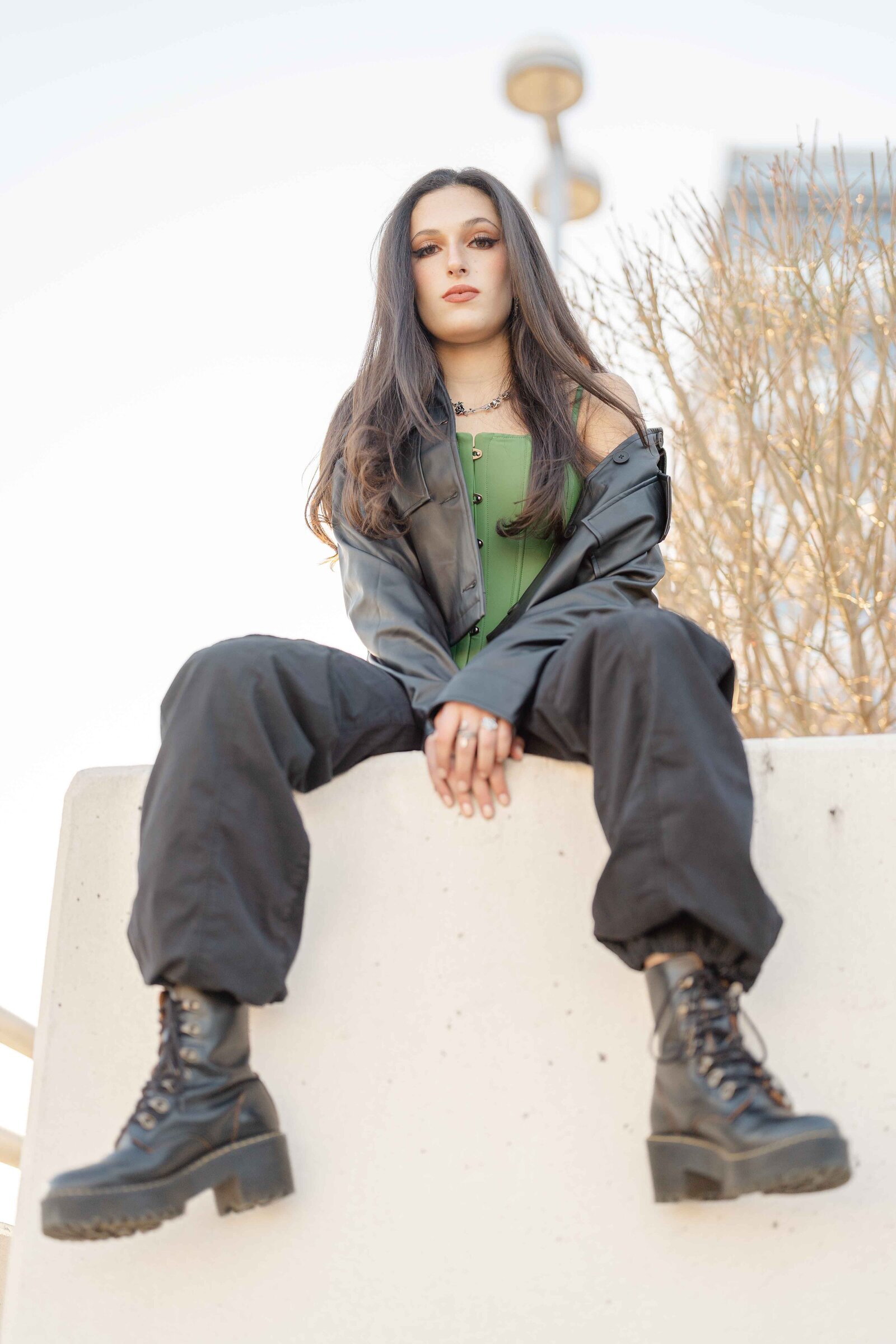 girl sitting during senior picture in Reston, VA