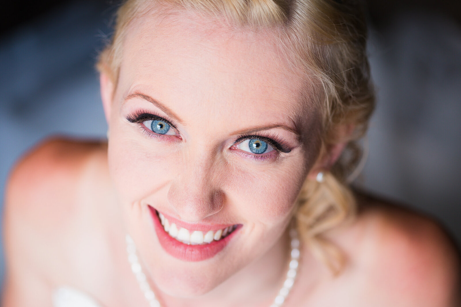 Bridal portrait with pearl necklace.
