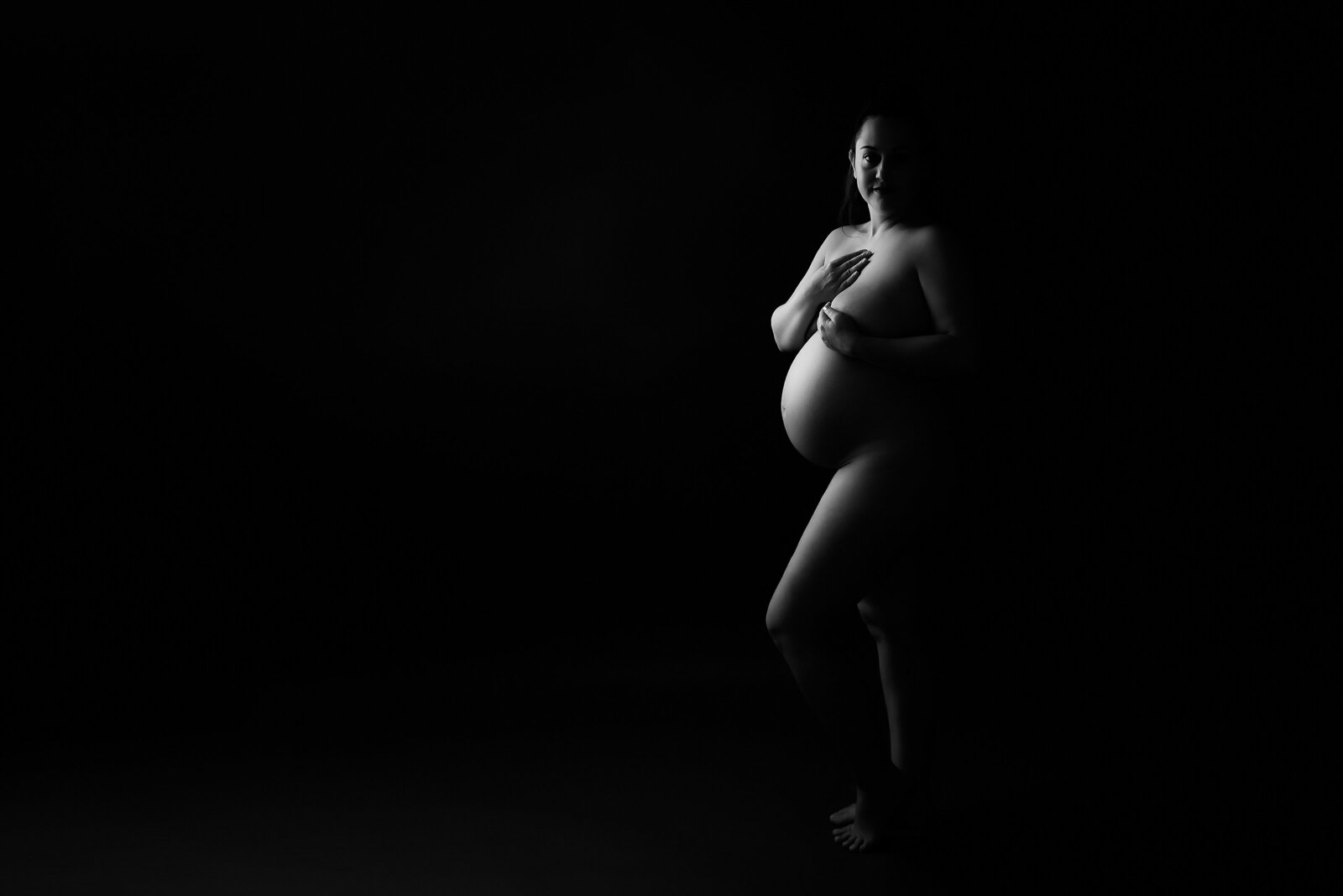 creative black and white maternity portrait in studio