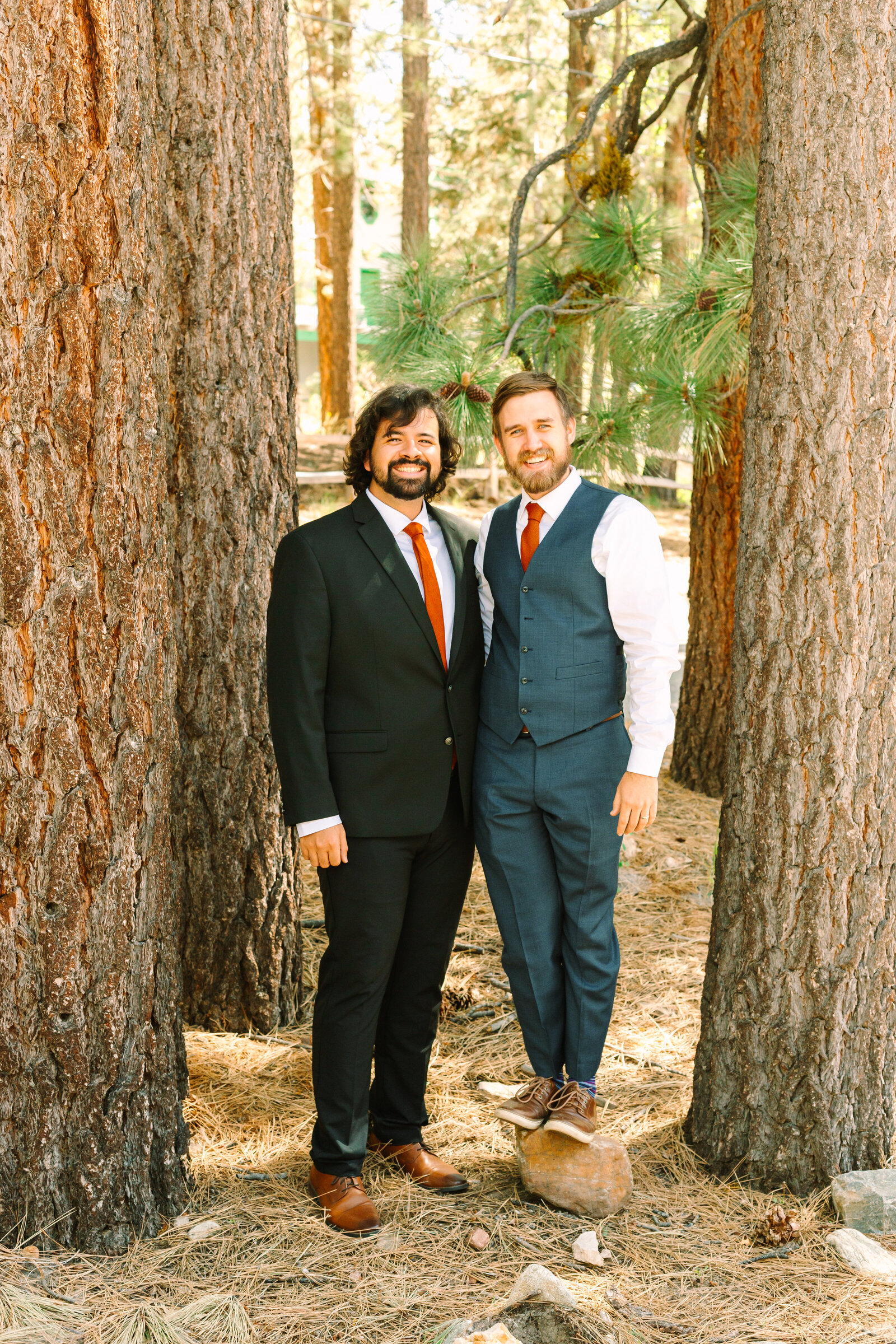 The bridal party celebrates an intimate elopement at a cabin at Big Bear Lake, California.