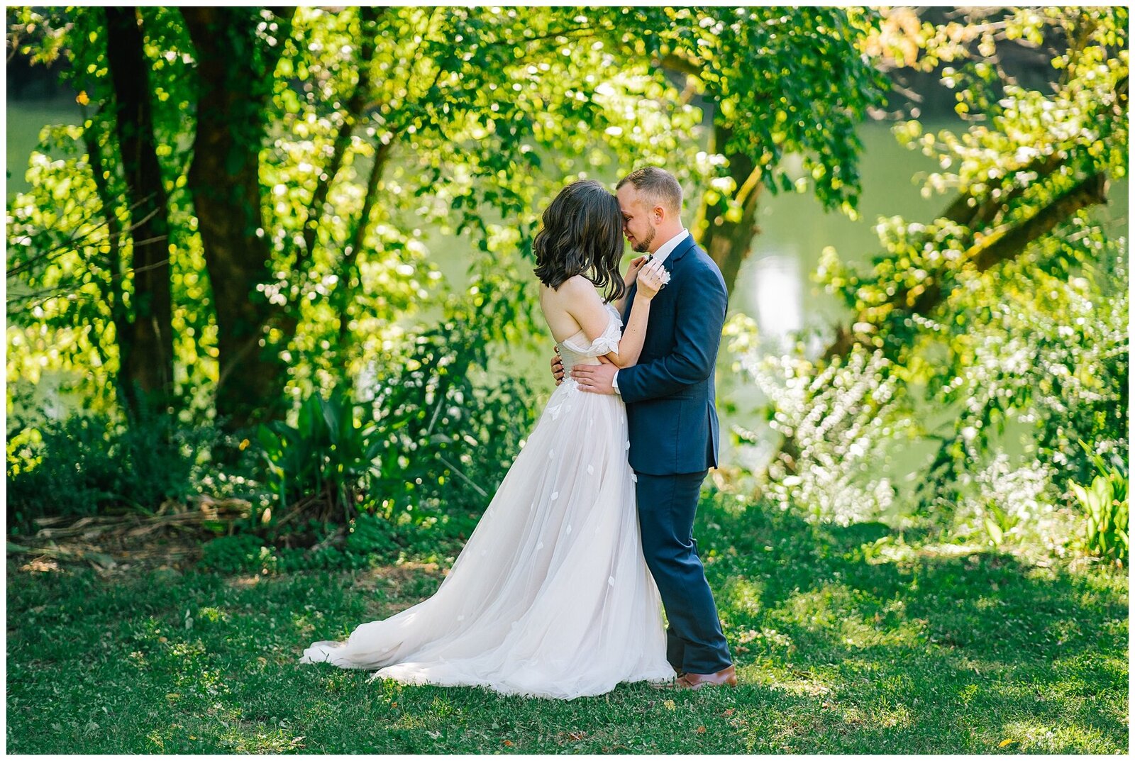 Sacramento Wedding Photographer captures couple touching foreheads during bridal portraits