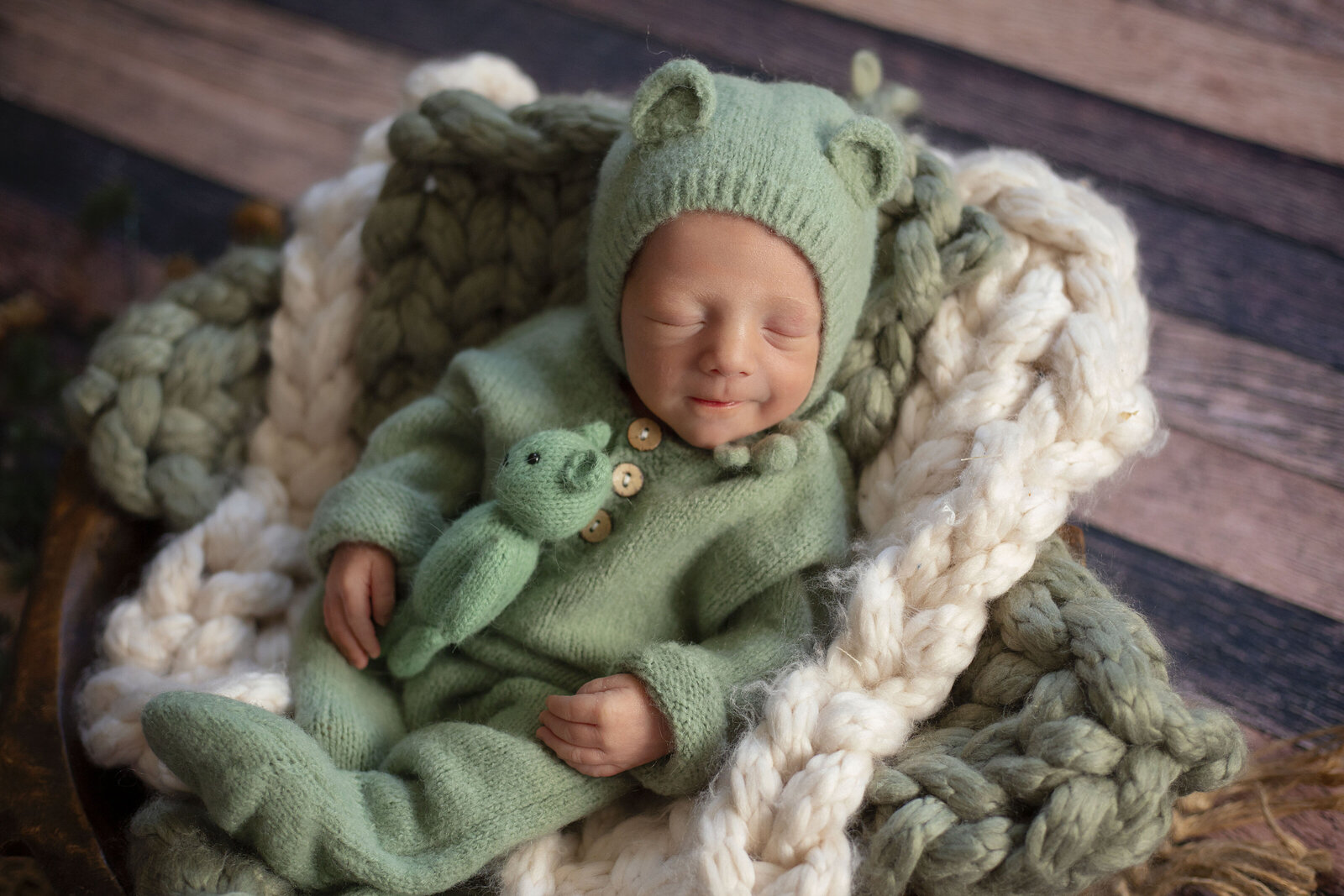 Newborn-boy-session-with-sage-green