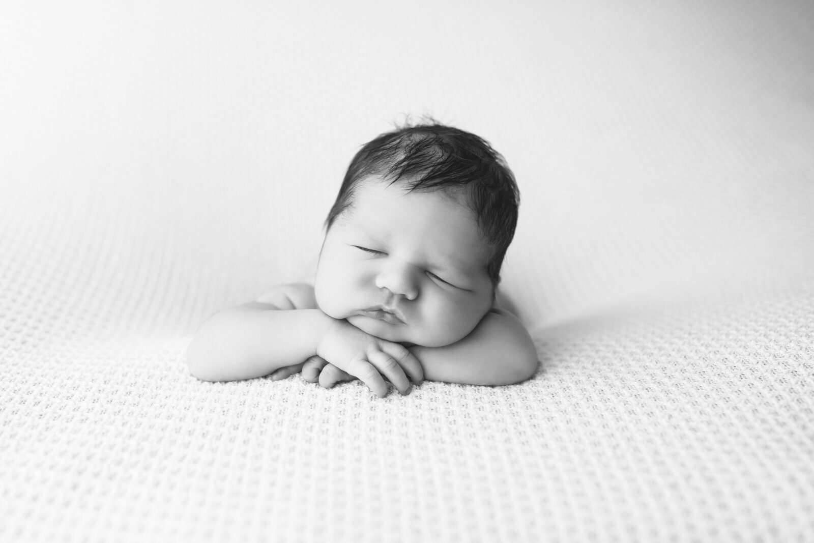 Newborn boy sleeps in studio near Birmingham