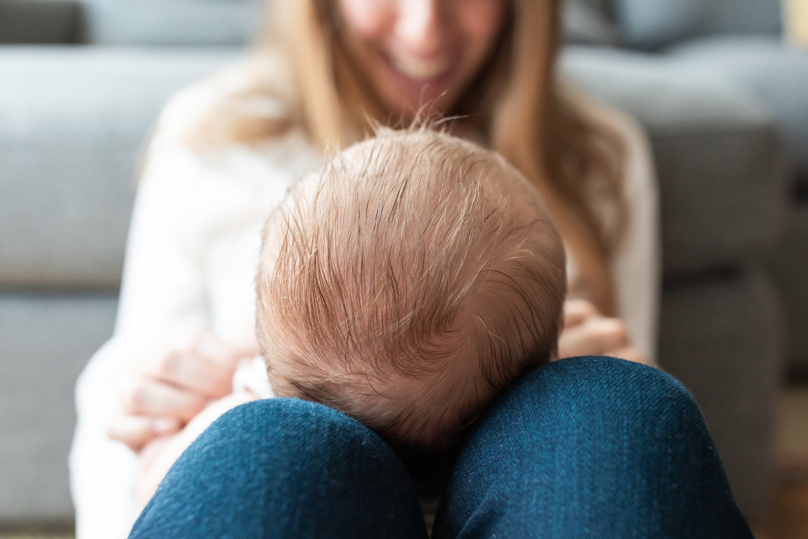 mother holding newborn